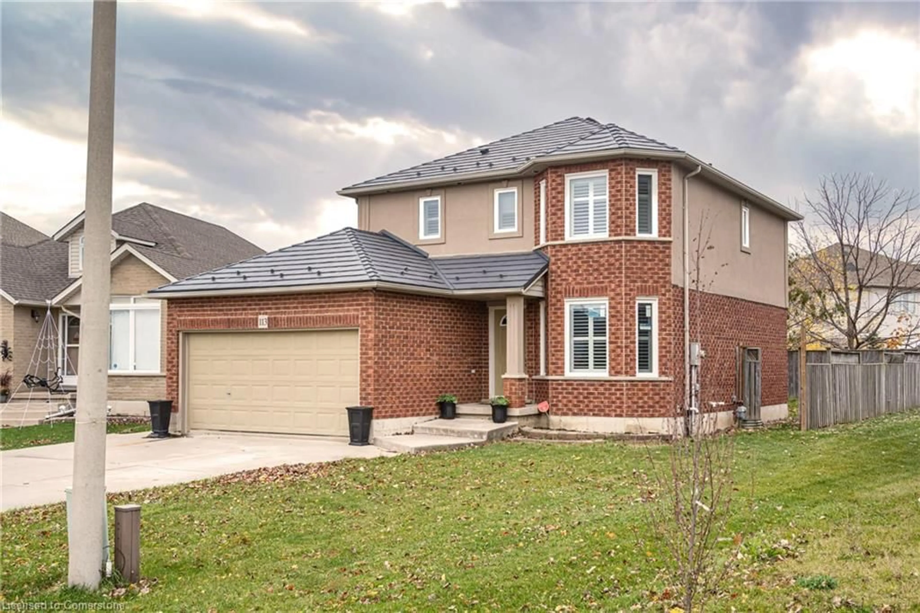 Home with brick exterior material for 113 Dulgaren St, Hamilton Ontario L8W 3Y8