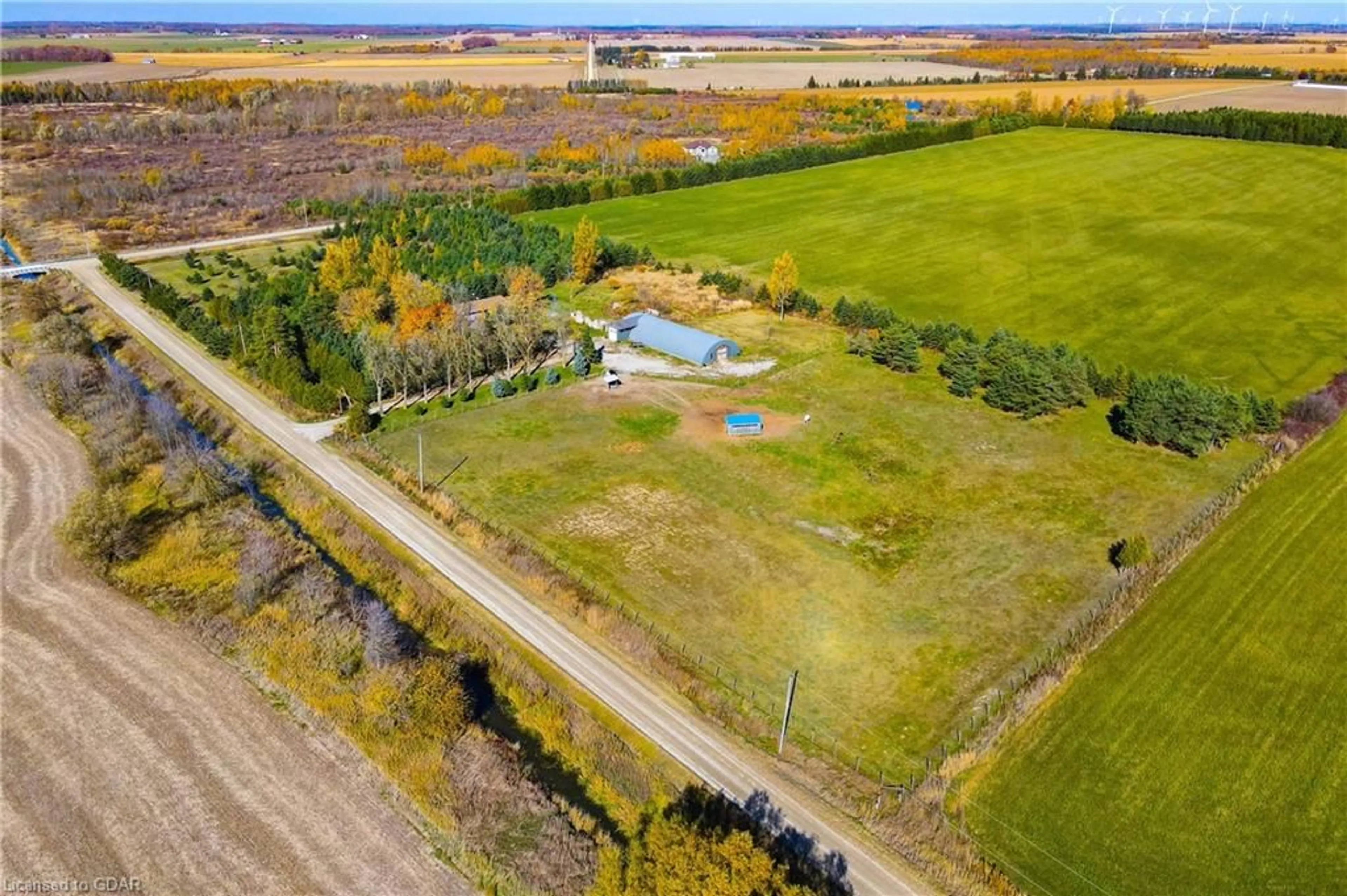 A pic from exterior of the house or condo, the fenced backyard for 7167 Seventh Line, Belwood Ontario N0B 1J0