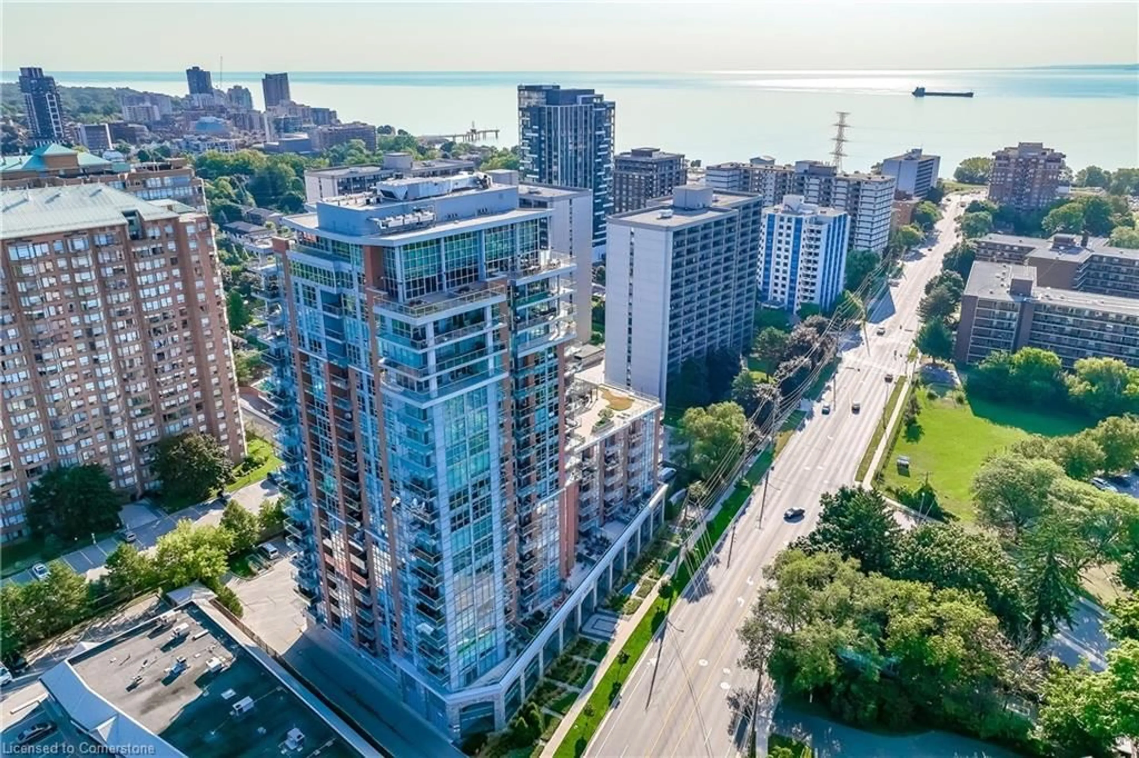 A pic from exterior of the house or condo, the view of city buildings for 551 Maple Ave #1202, Burlington Ontario L7S 1M7