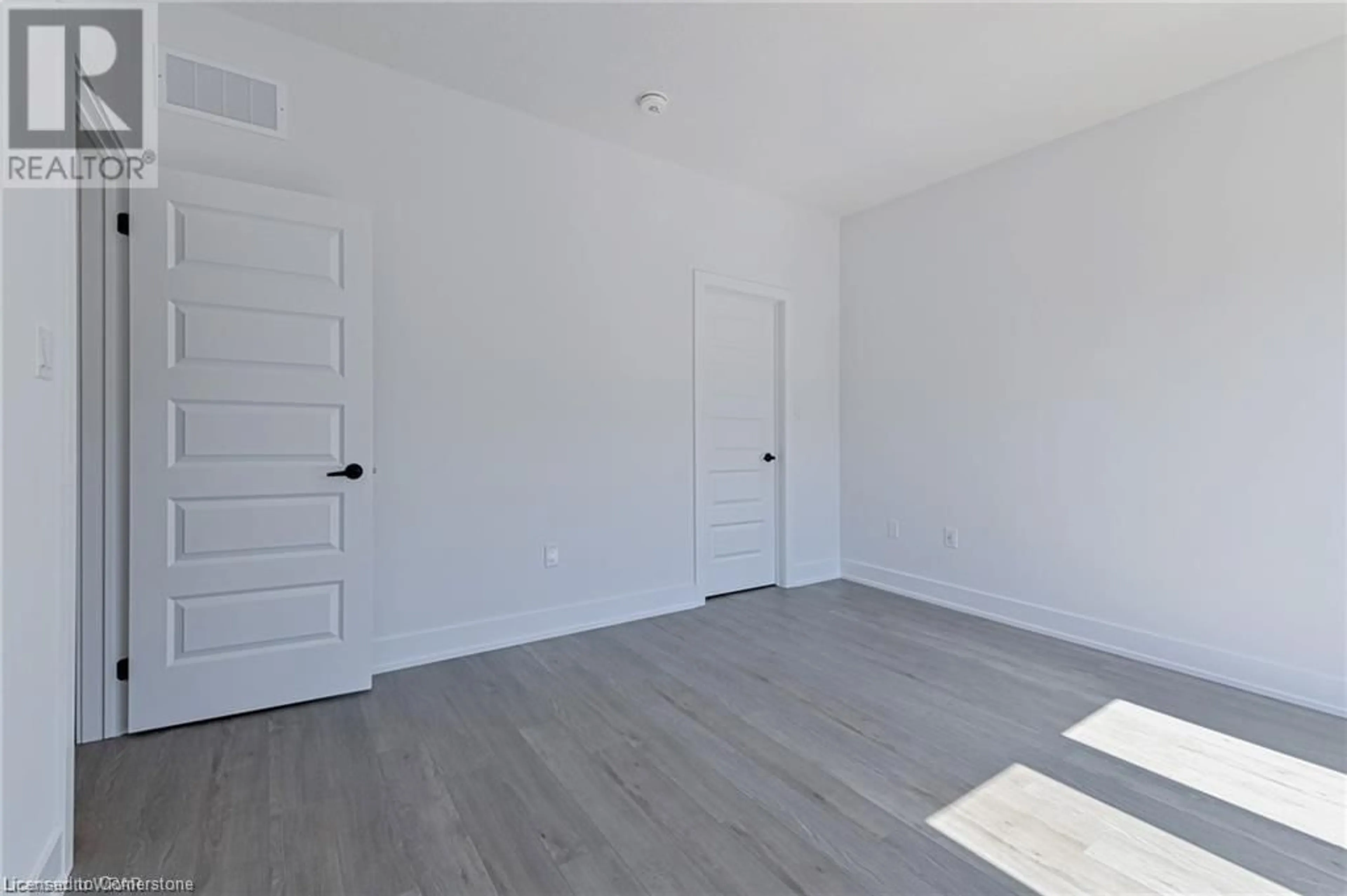 A pic of a room, wood floors for 99 Roger St #28, Waterloo Ontario N2J 0G1