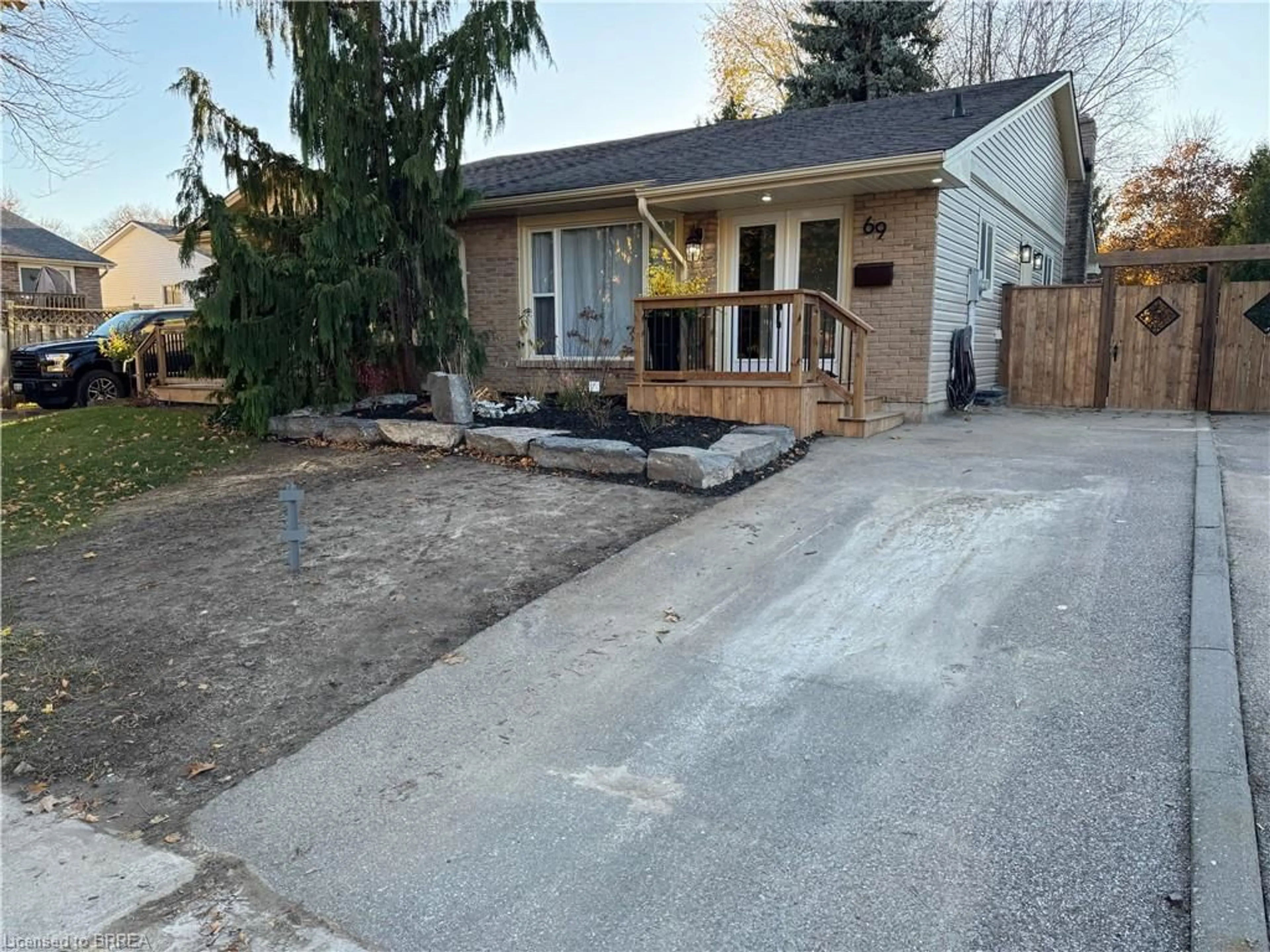 Frontside or backside of a home, the fenced backyard for 69 Ivanhoe Rd, Brantford Ontario N3R 6V3