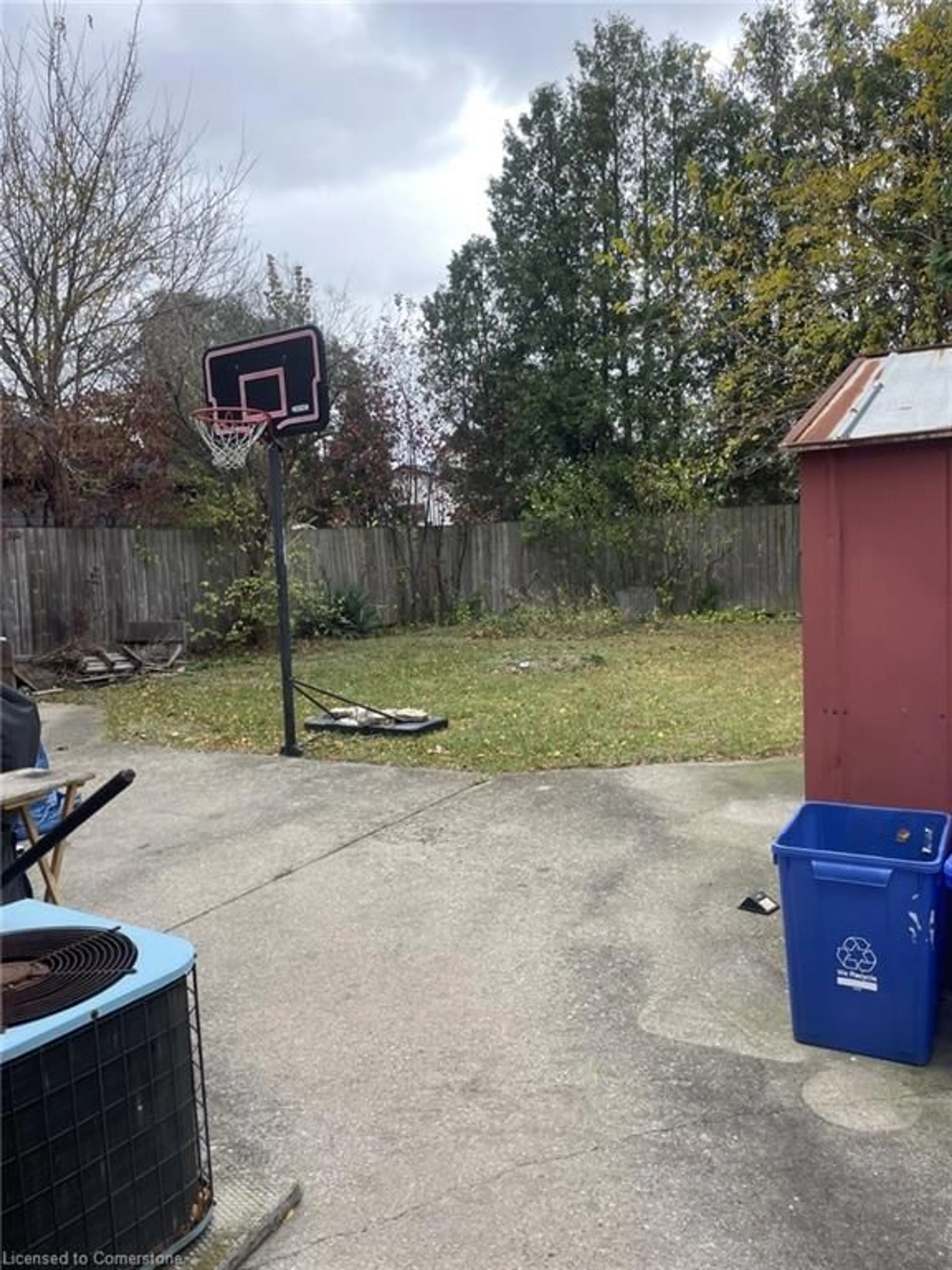 Frontside or backside of a home, the fenced backyard for 83 East 41st St, Hamilton Ontario L8T 2Z5