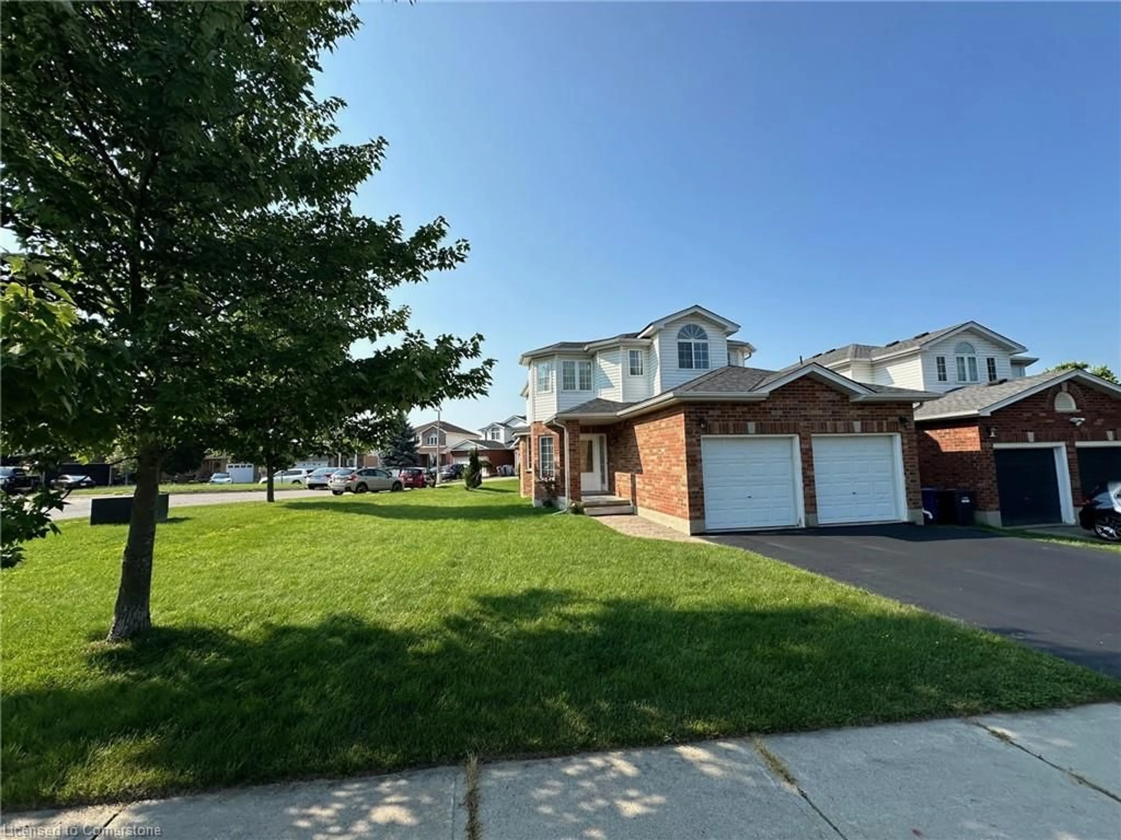 Frontside or backside of a home, the street view for 47 Bond Crt, Guelph Ontario N1H 8N6