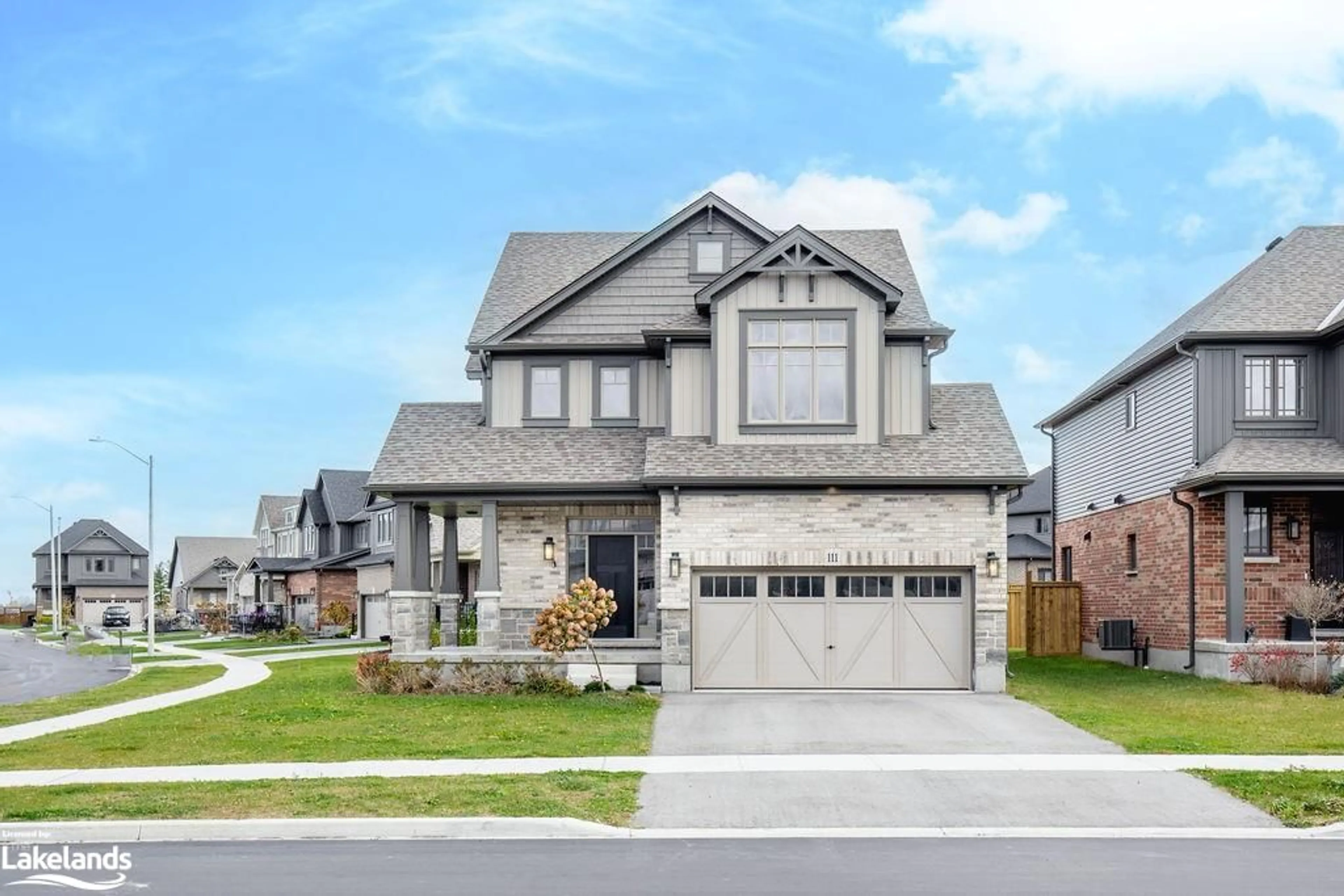 Frontside or backside of a home, the street view for 111 Plewes Dr, Collingwood Ontario L9Y 3B7