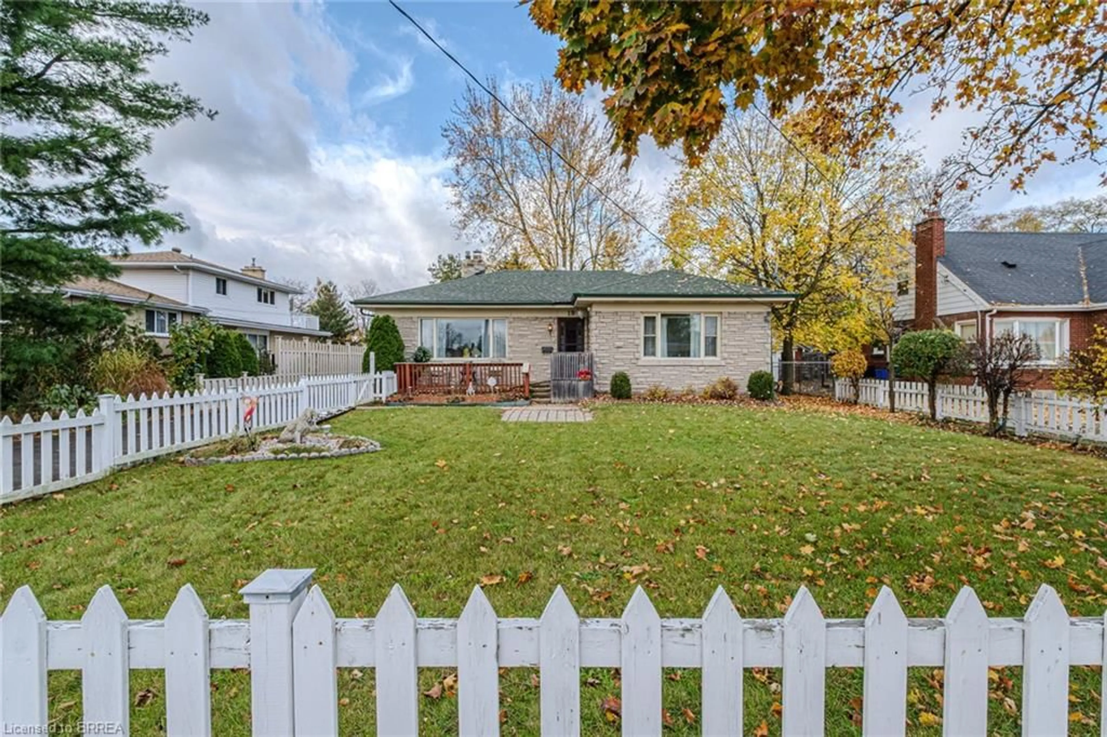 A pic from exterior of the house or condo, the fenced backyard for 19 King George Rd, Brantford Ontario N3R 5J8