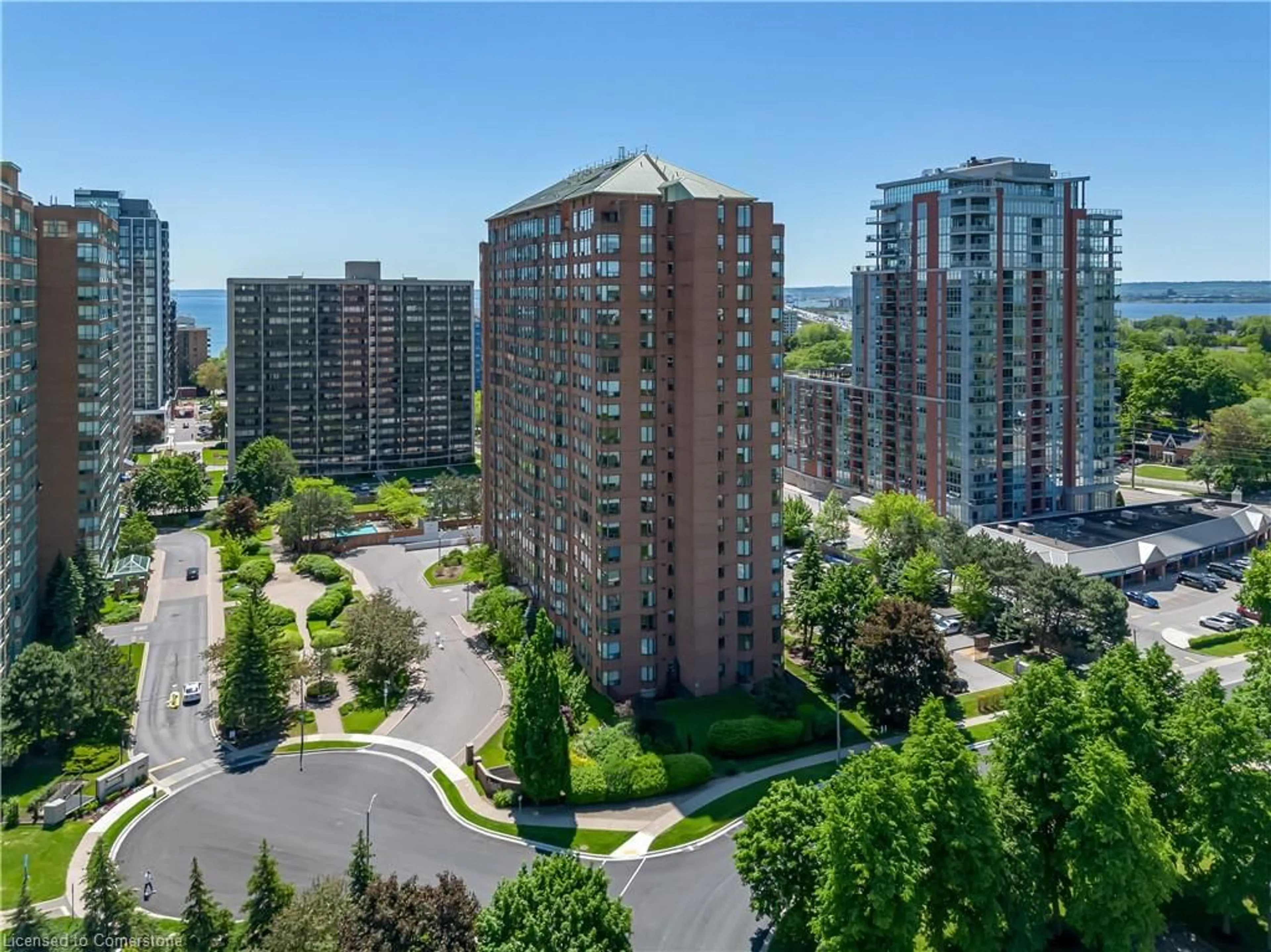 A pic from exterior of the house or condo, the view of city buildings for 1270 Maple Crossing Blvd #1702, Burlington Ontario L7S 2J3