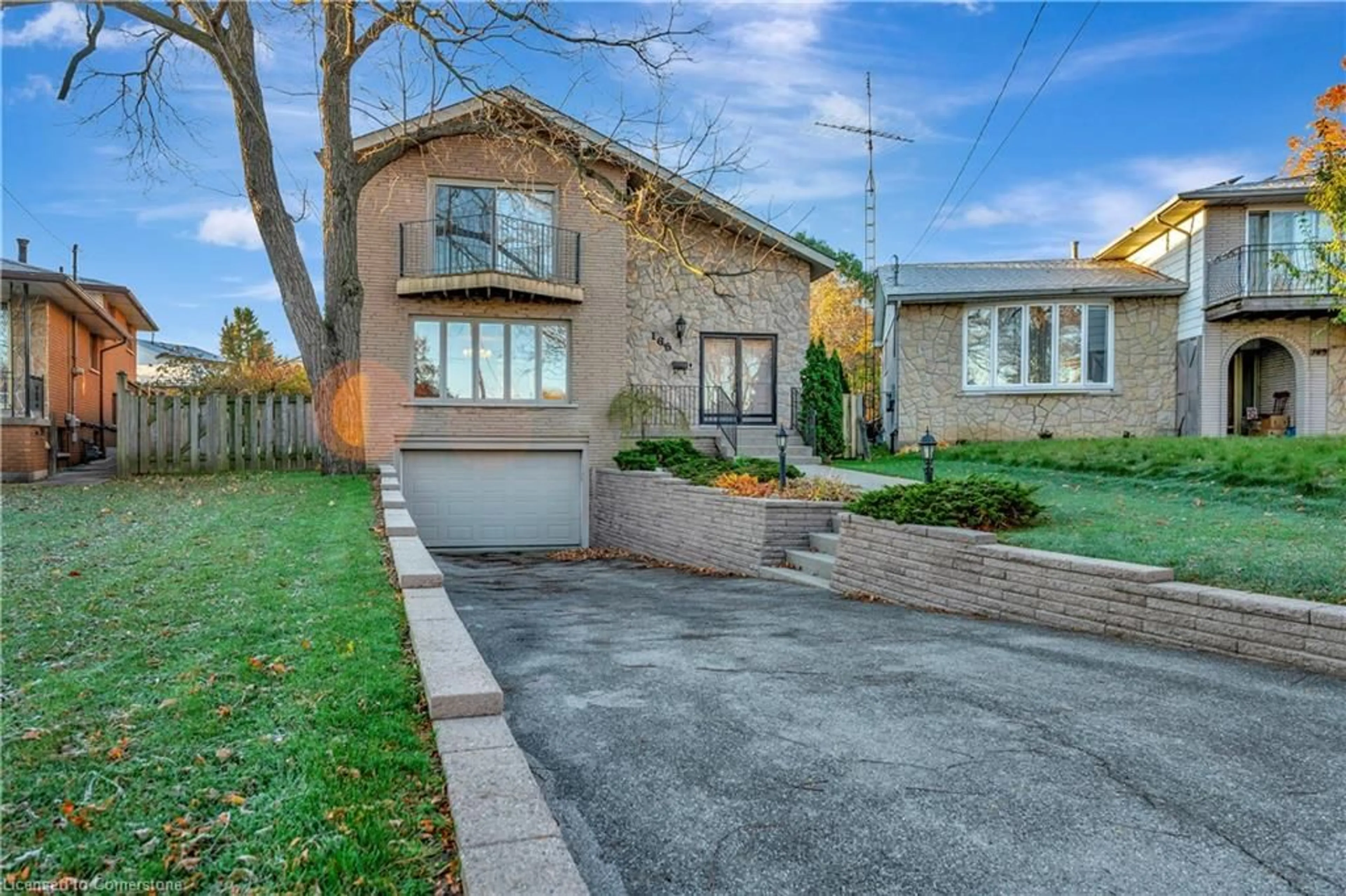 Frontside or backside of a home, the street view for 165 Burrwood Dr, Hamilton Ontario L9C 3T3