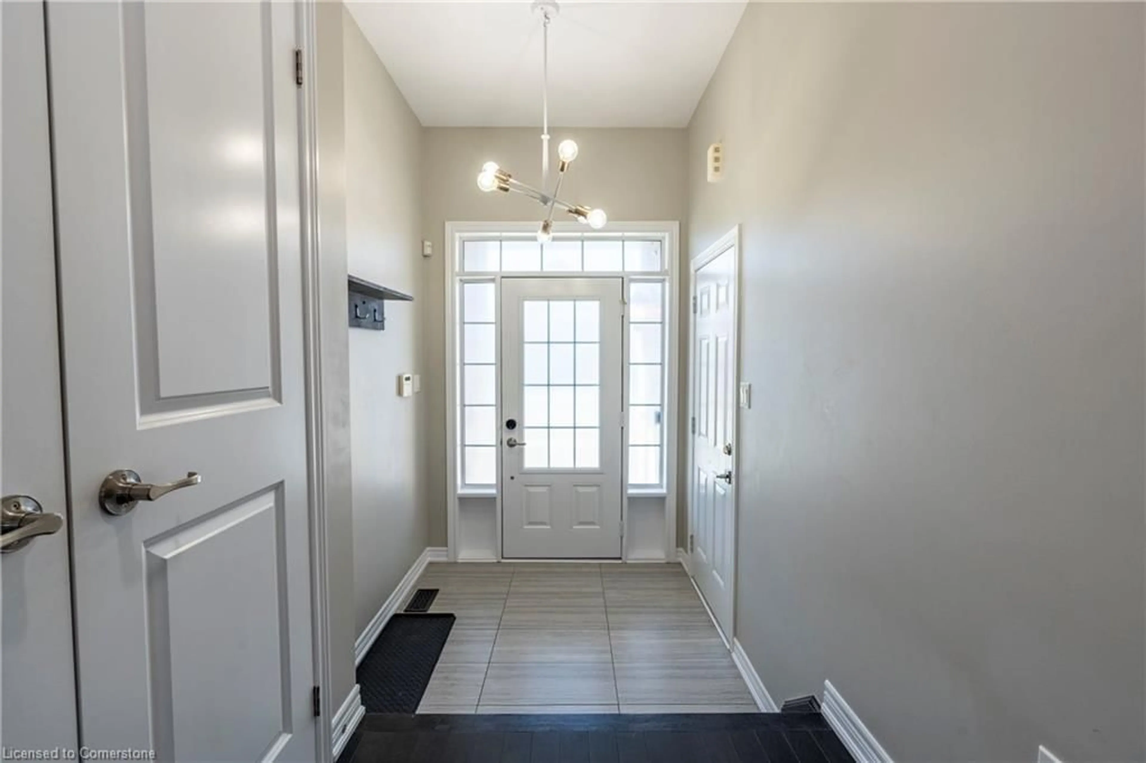 Indoor entryway, wood floors for 219 Falconridge Dr, Kitchener Ontario N2K 0B6