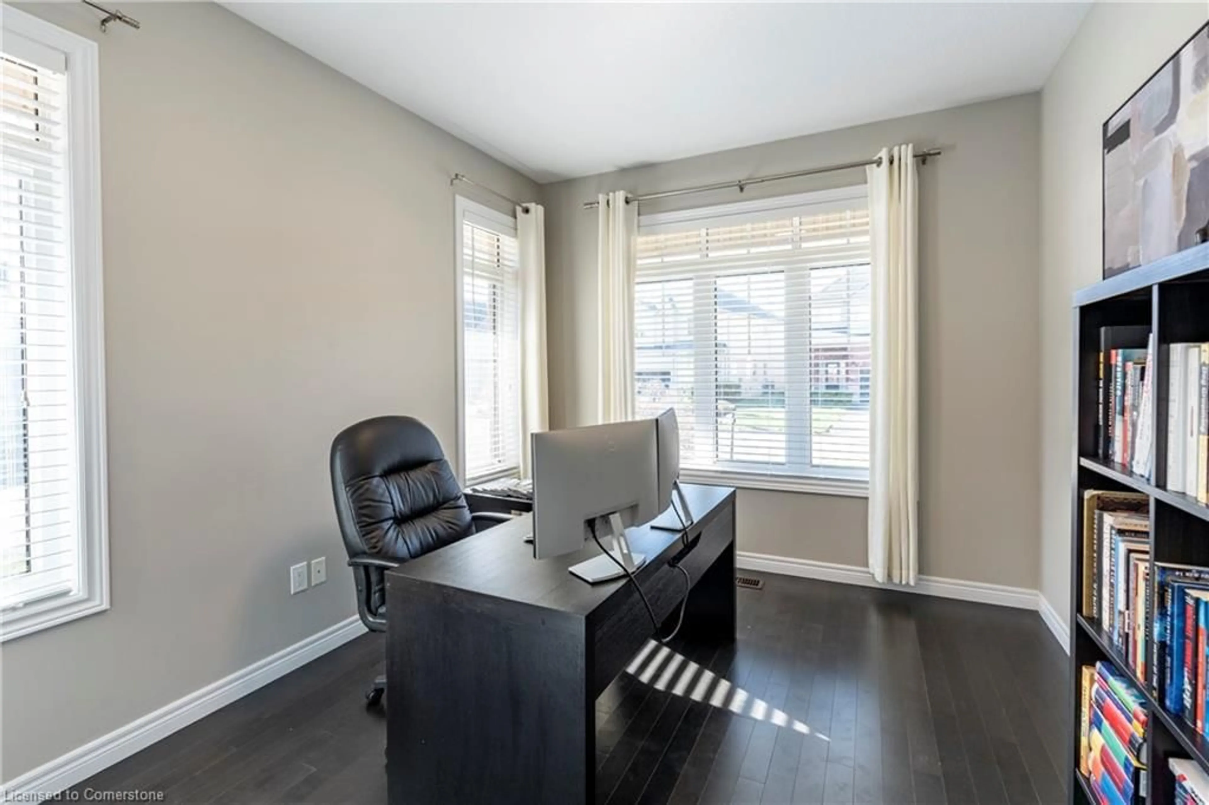 A pic of a room, wood floors for 219 Falconridge Dr, Kitchener Ontario N2K 0B6