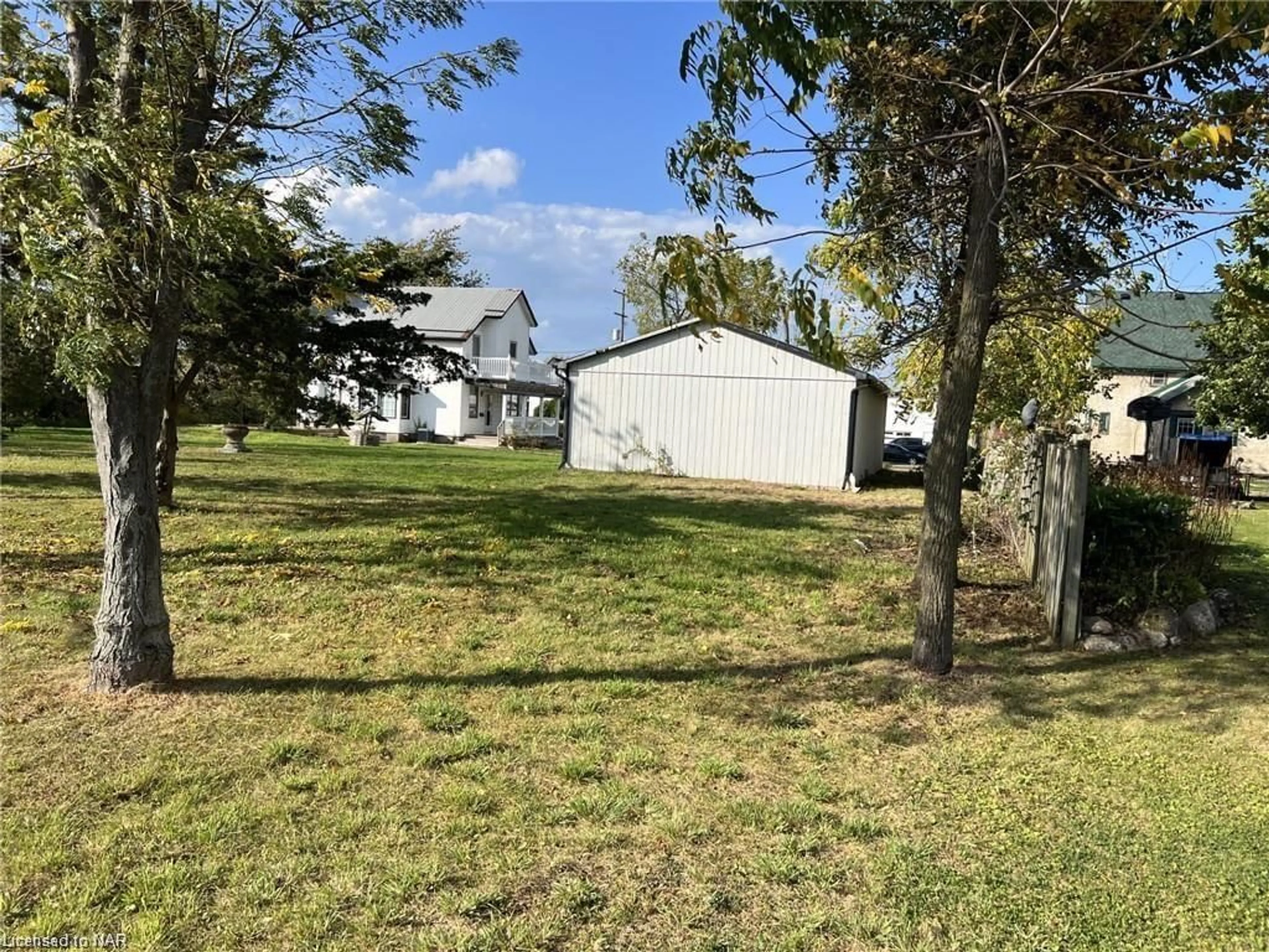 Frontside or backside of a home, the fenced backyard for 4188 Linden Ave, Campden Ontario L0R 2G0