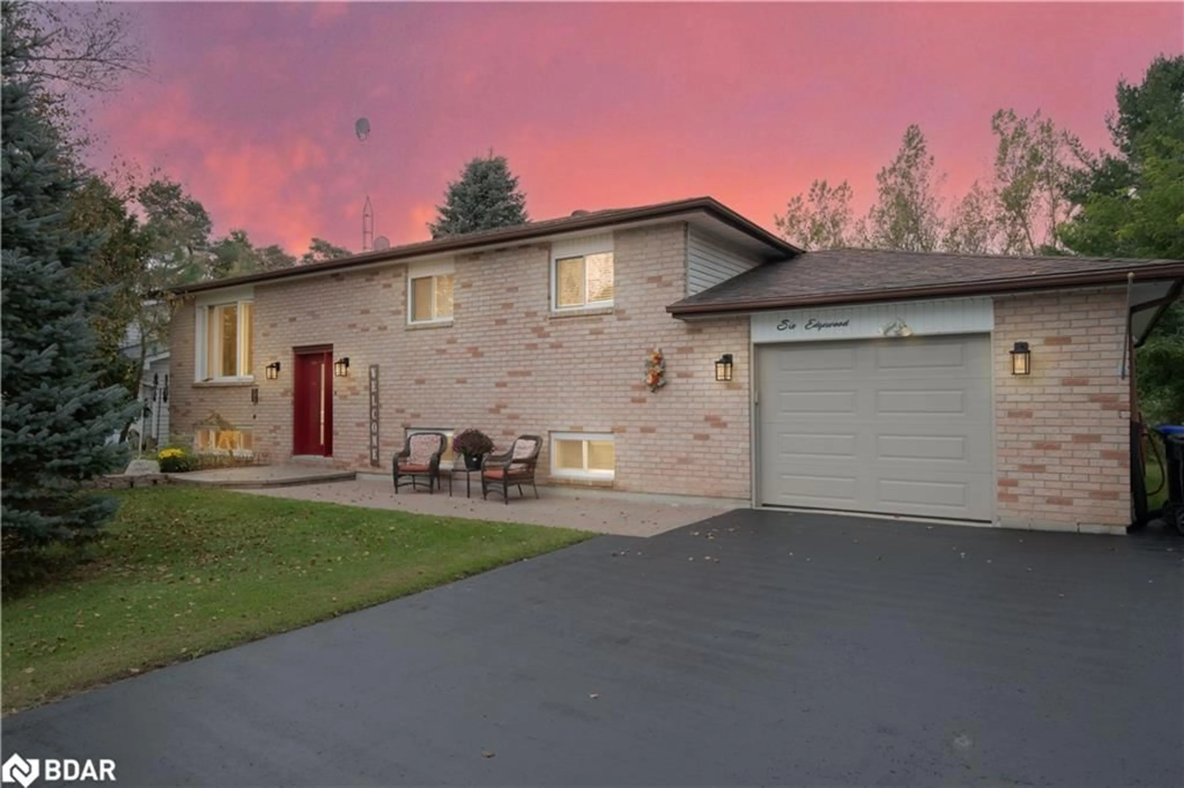 Frontside or backside of a home, the fenced backyard for 6 Edgewood Cres, New Lowell Ontario L0M 1N0