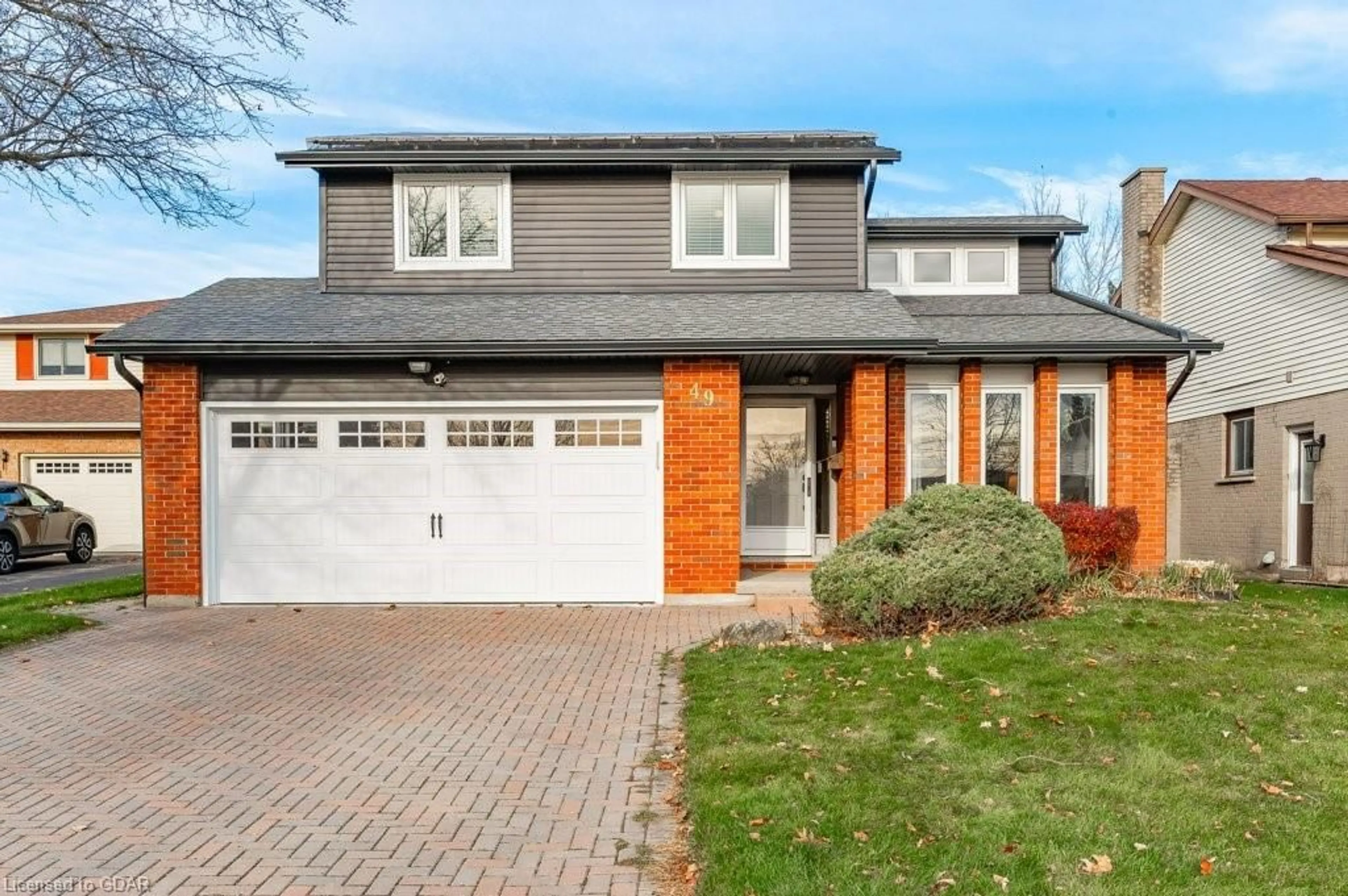 Home with brick exterior material for 49 Old Colony Trail, Guelph Ontario N1G 4A8