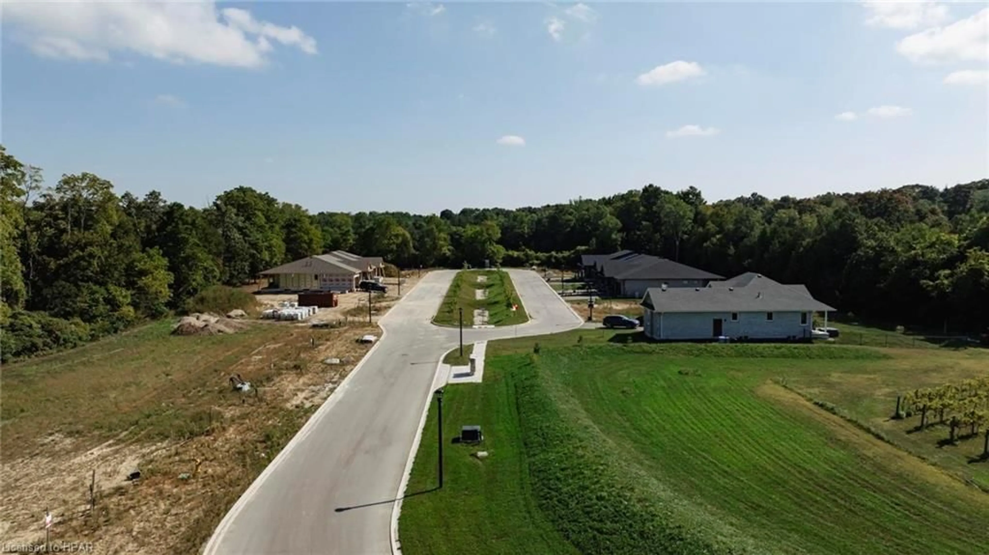 Frontside or backside of a home, the street view for 64 Deer Ridge Lane, Bayfield Ontario N0M 1G0