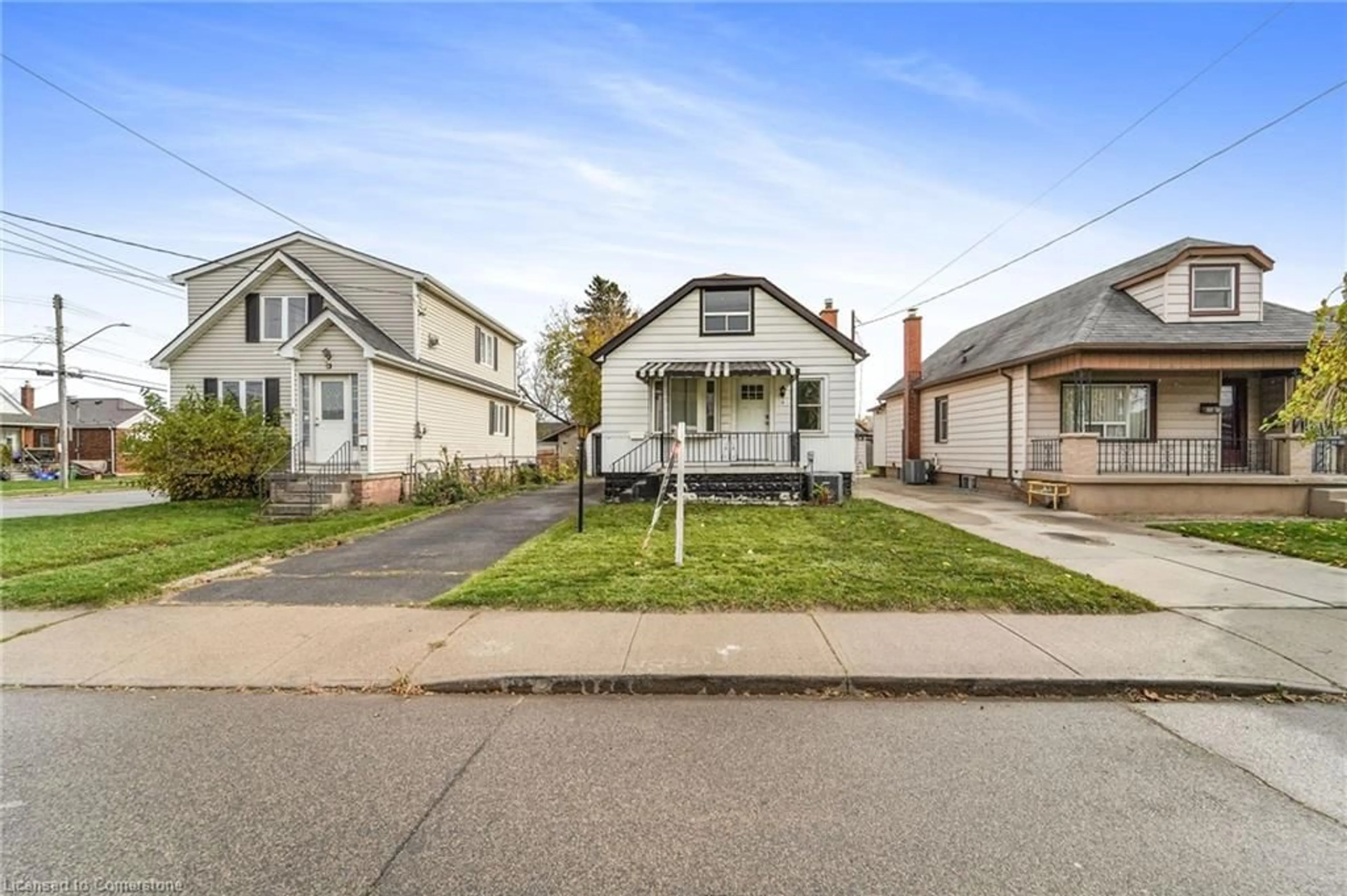 Frontside or backside of a home, the street view for 5 Rosewood Rd, Hamilton Ontario L8H 1A1