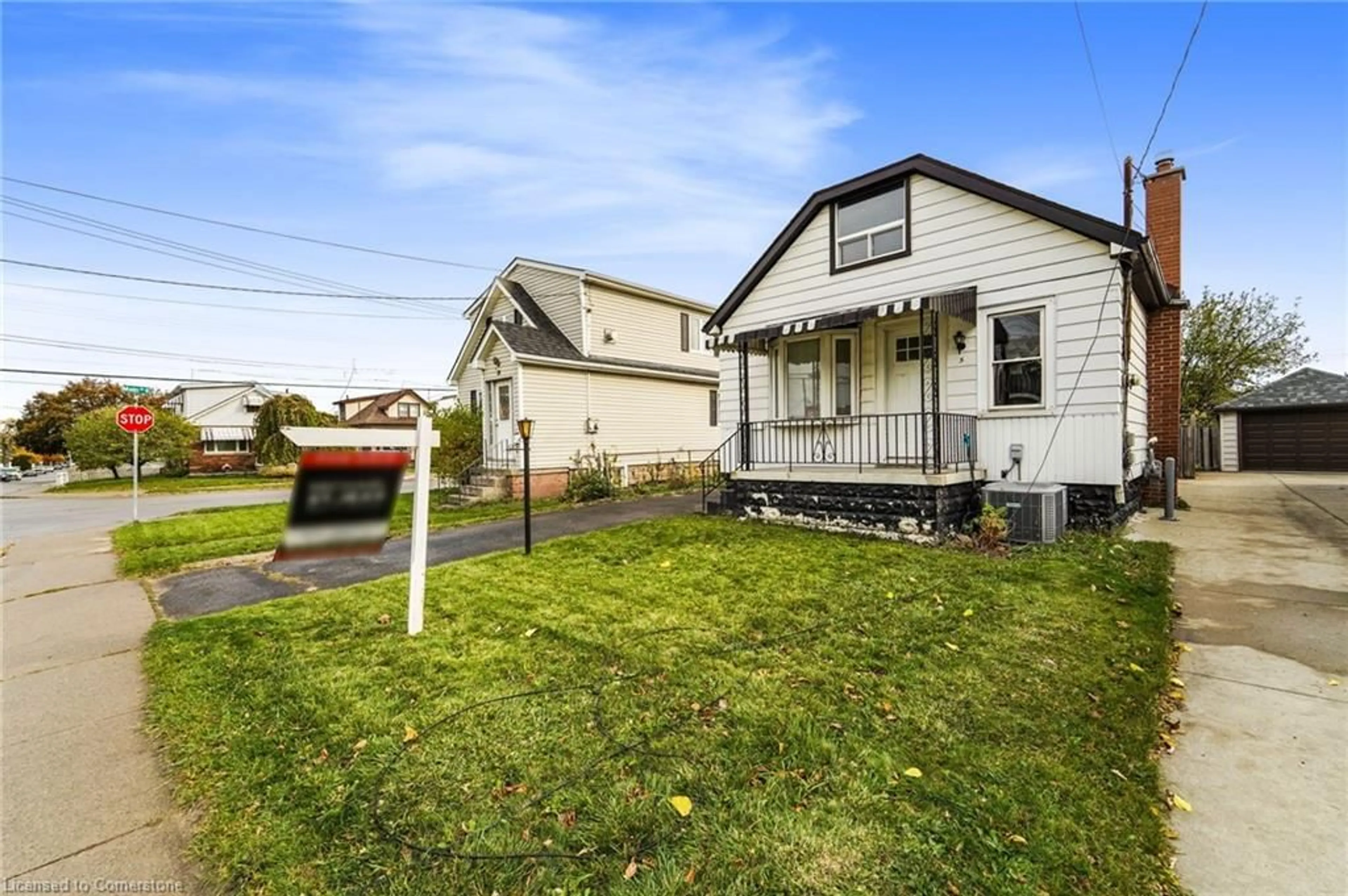 Frontside or backside of a home, the fenced backyard for 5 Rosewood Rd, Hamilton Ontario L8H 1A1