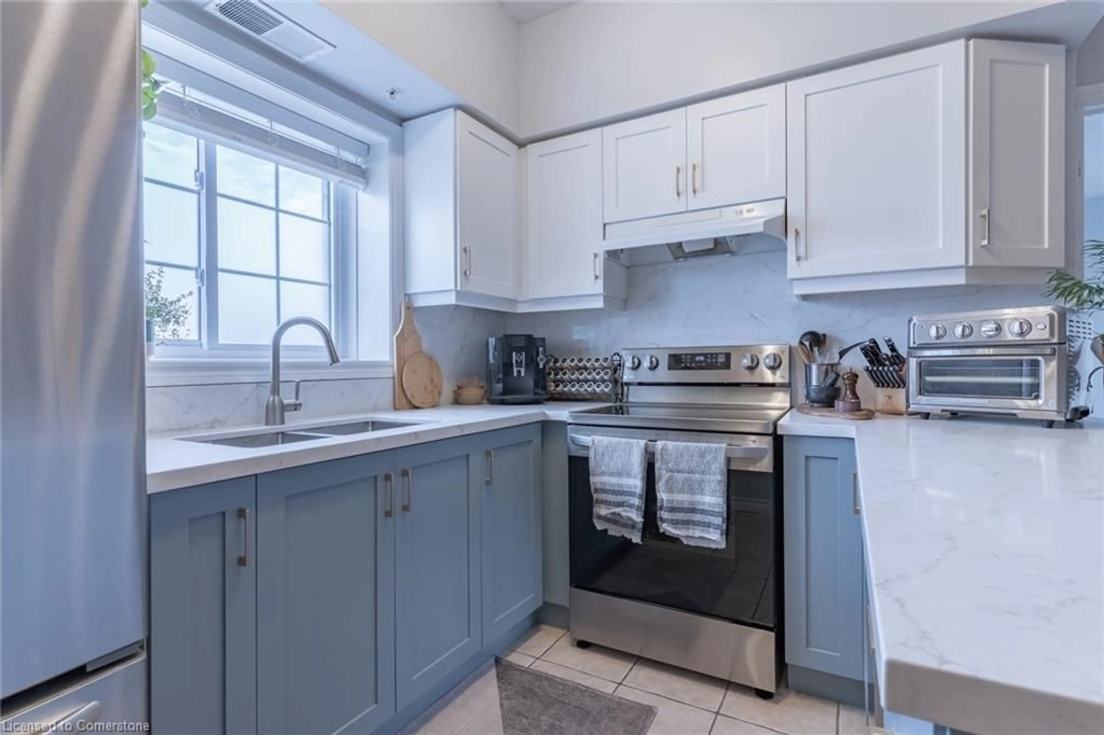 Standard kitchen, wood floors, cottage for 415 Grange Rd #104, Guelph Ontario N1E 0C4