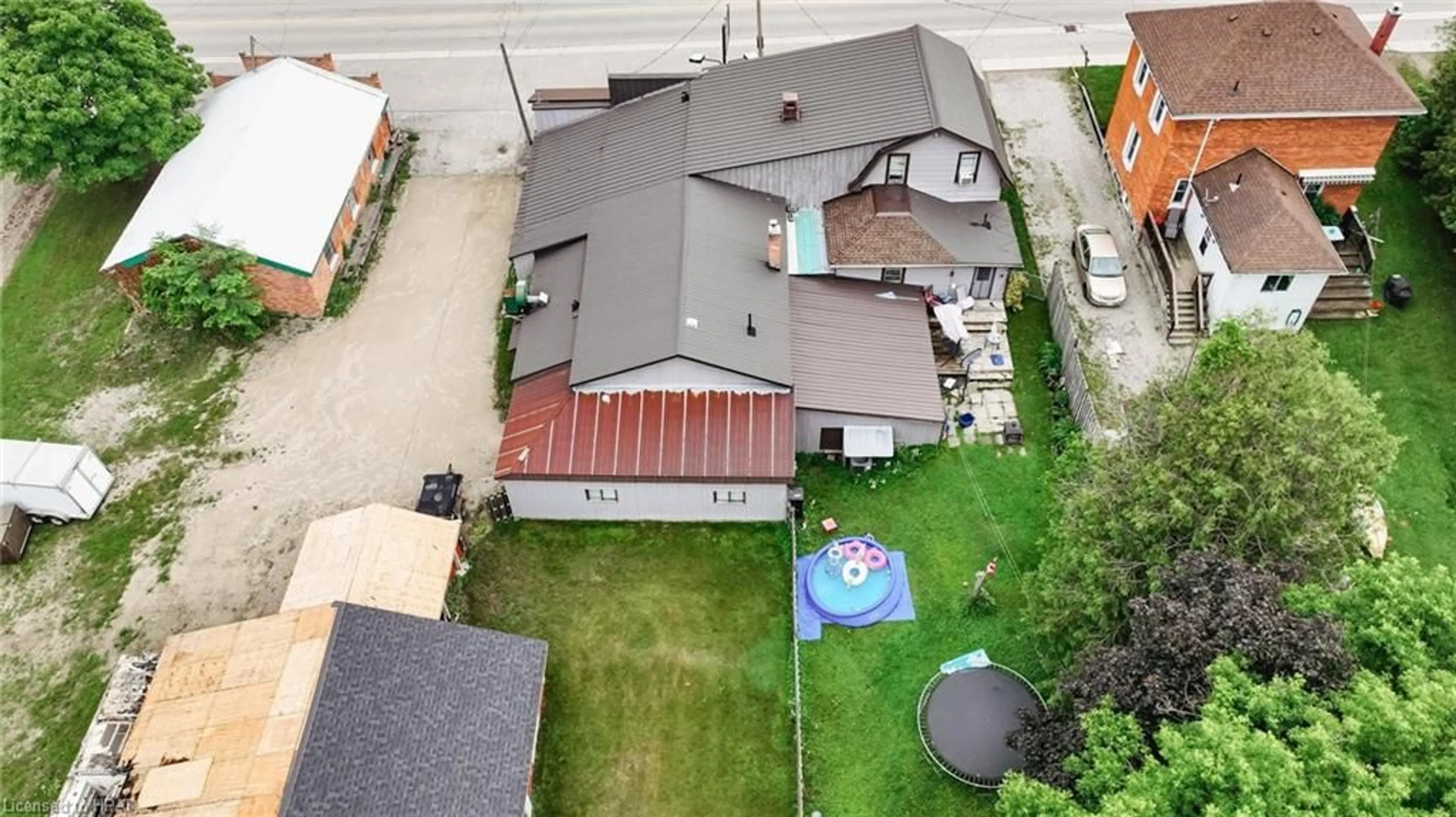 Frontside or backside of a home, the fenced backyard for 3064 Patrick St, Fordwich Ontario N0G 1V0