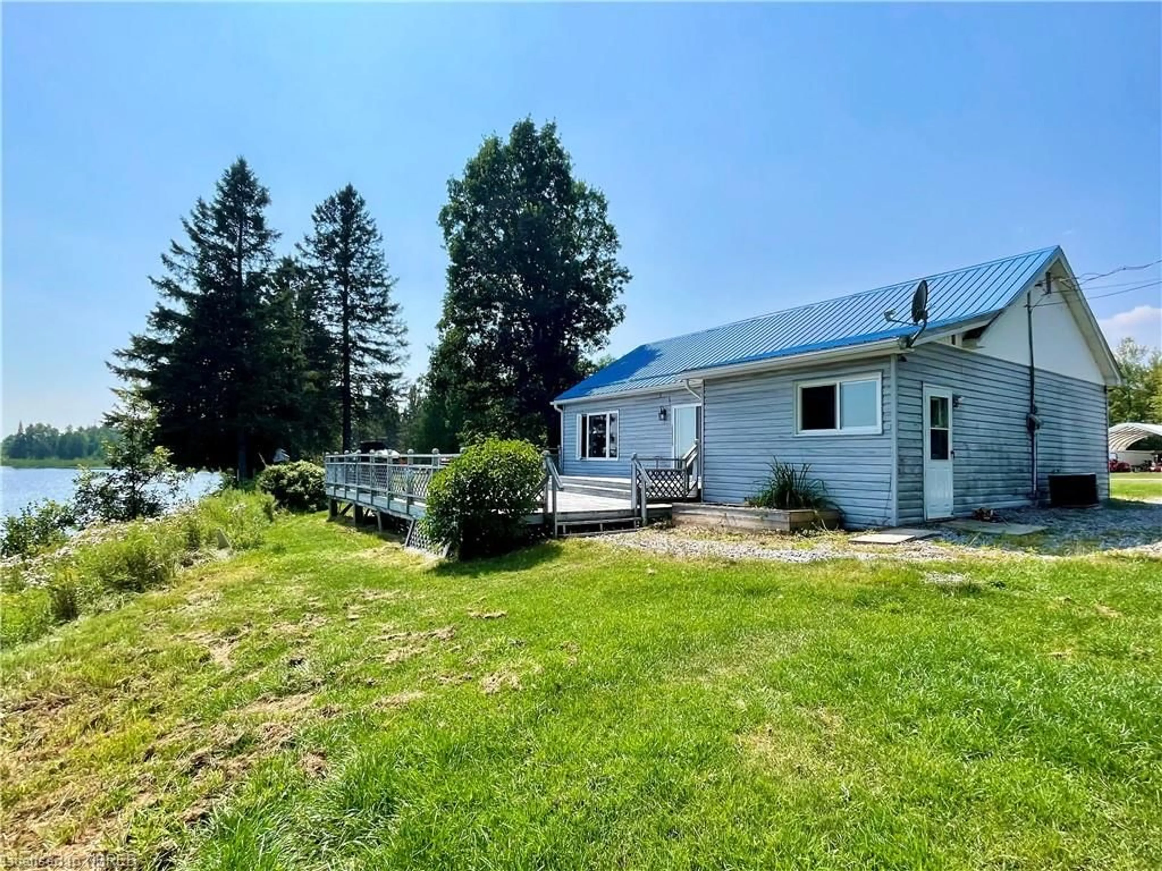 A pic from outside/outdoor area/front of a property/back of a property/a pic from drone, water/lake/river/ocean view for 234 Levert Dr, Sturgeon Falls Ontario P2B 2P2