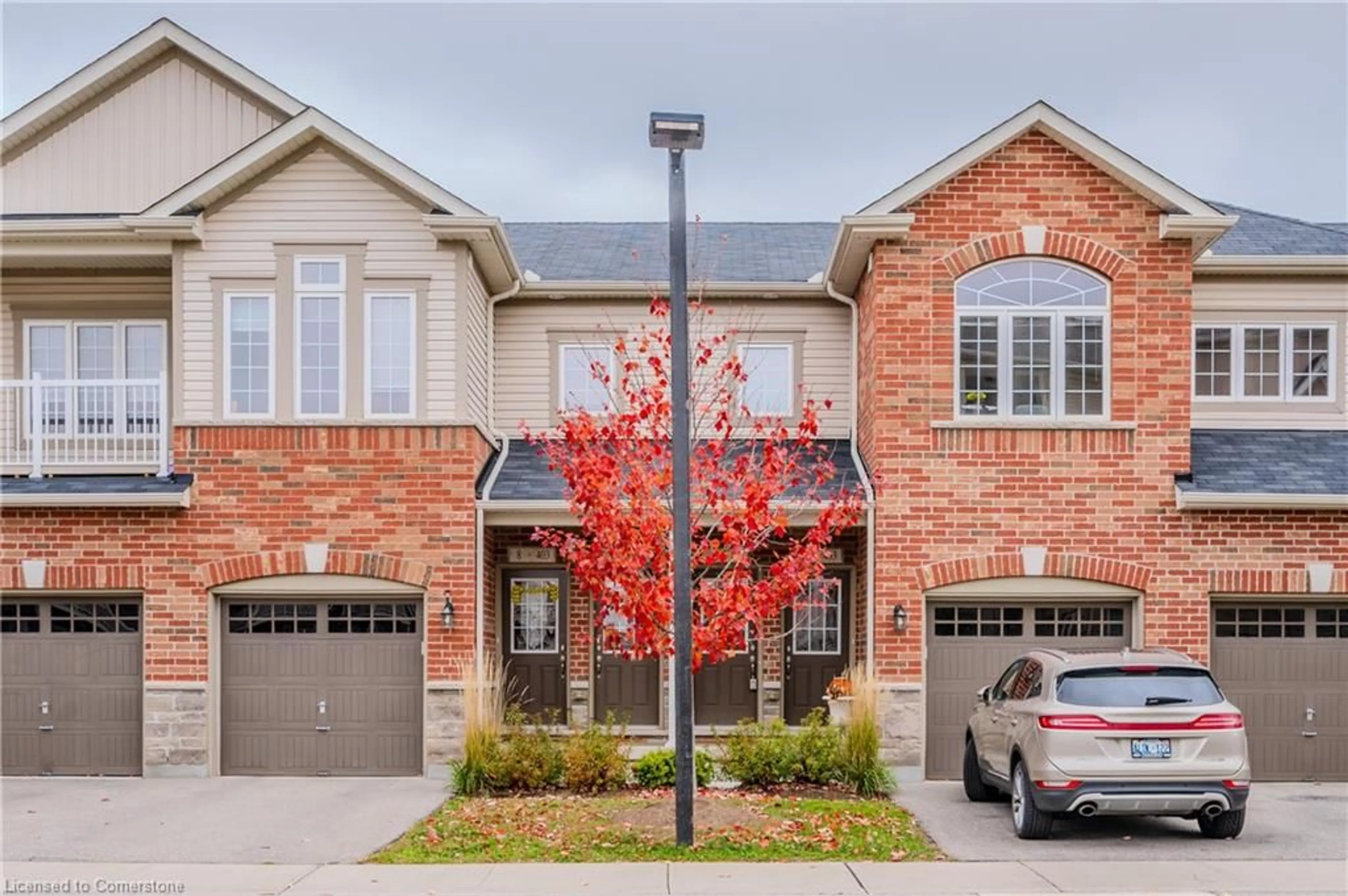 A pic from exterior of the house or condo, the street view for 403 Westwood Dr #4, Kitchener Ontario N2M 0B5