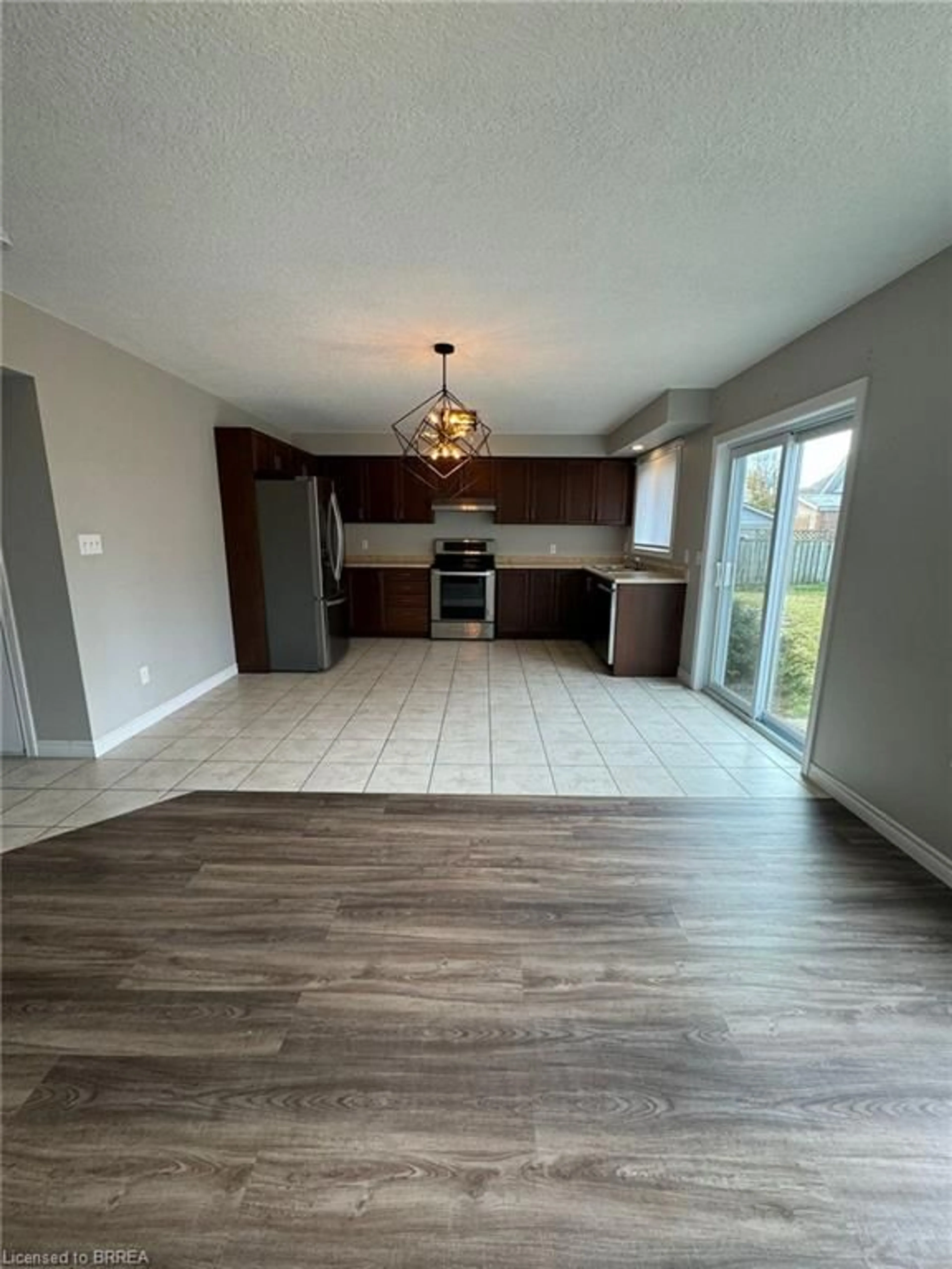 A pic of a room, wood floors for 68 Bay St, Woodstock Ontario N4S 3K9