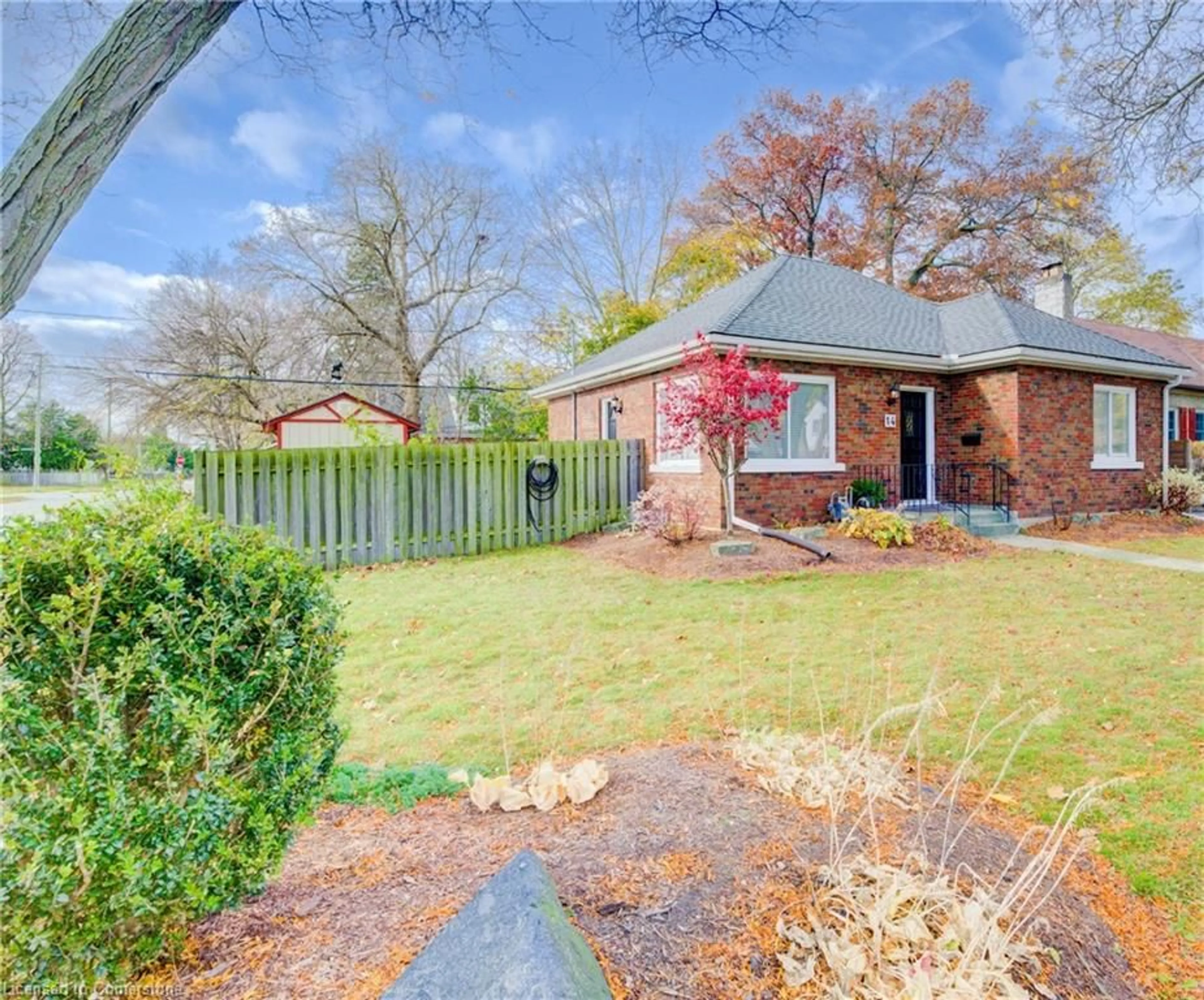 Frontside or backside of a home, the fenced backyard for 14 Dudhope Ave, Cambridge Ontario N1R 4T1