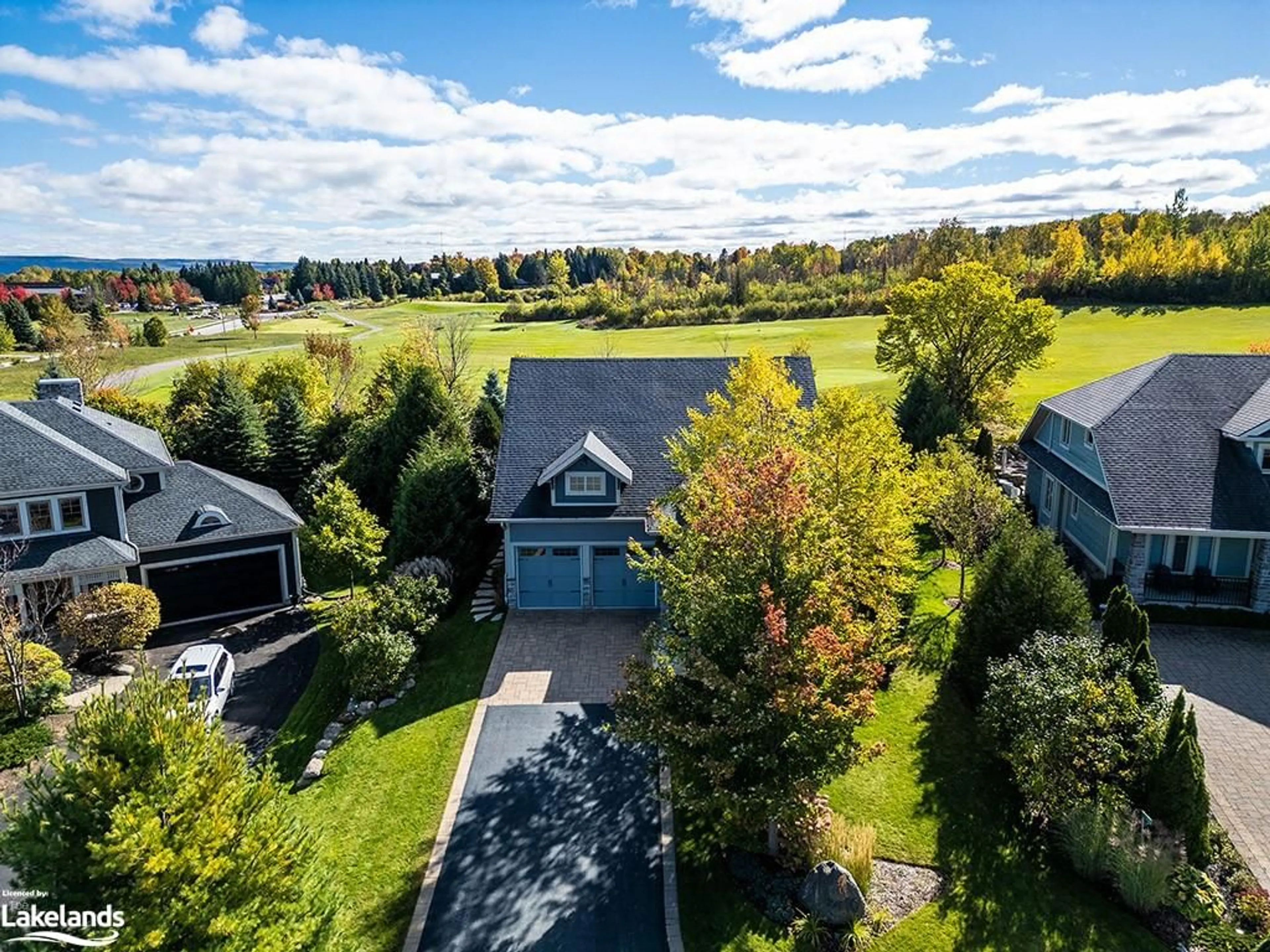 Frontside or backside of a home, the fenced backyard for 110 Landry Lane, Thornbury Ontario N0H 2P0