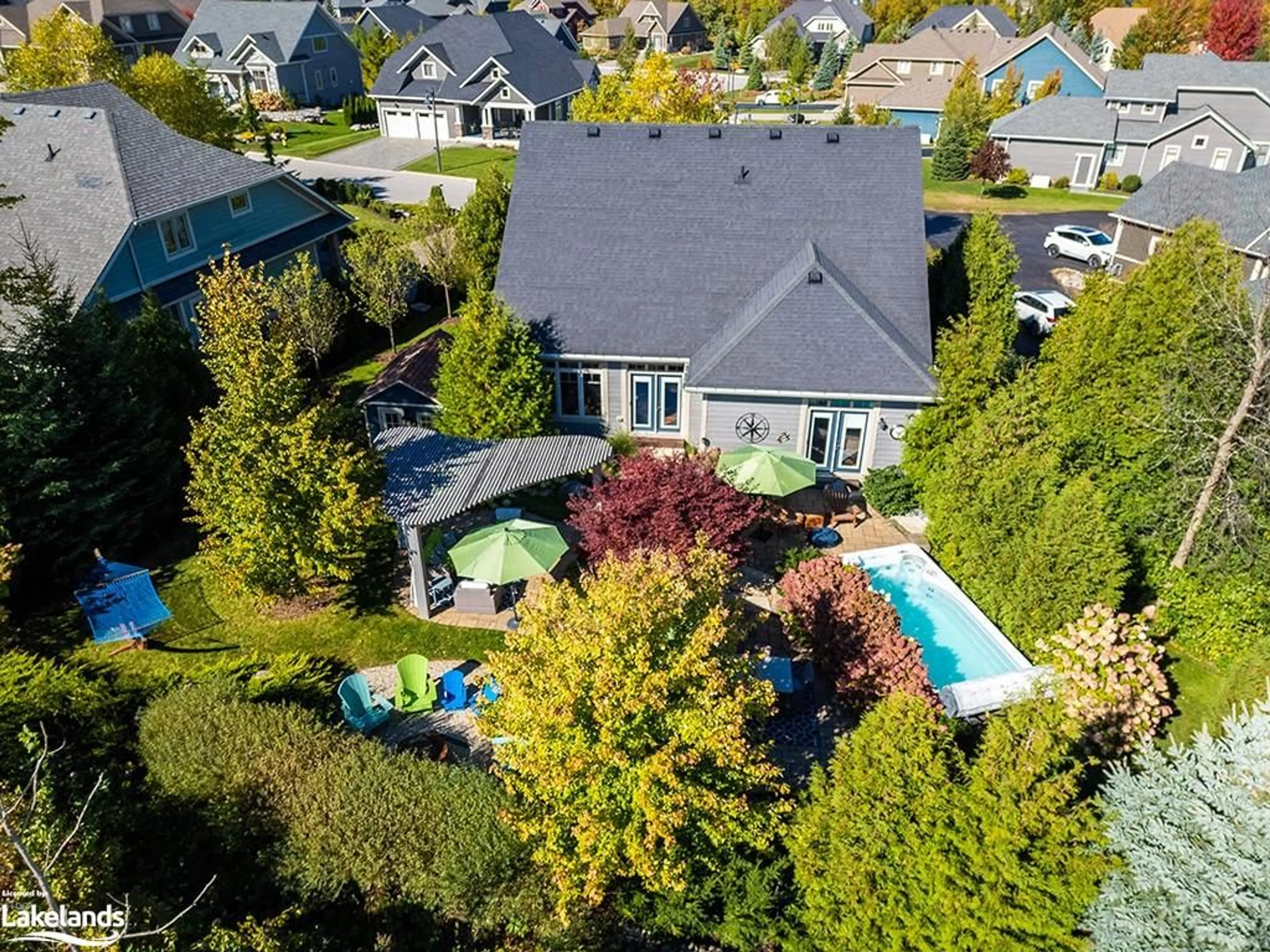 Frontside or backside of a home, the fenced backyard for 110 Landry Lane, Thornbury Ontario N0H 2P0