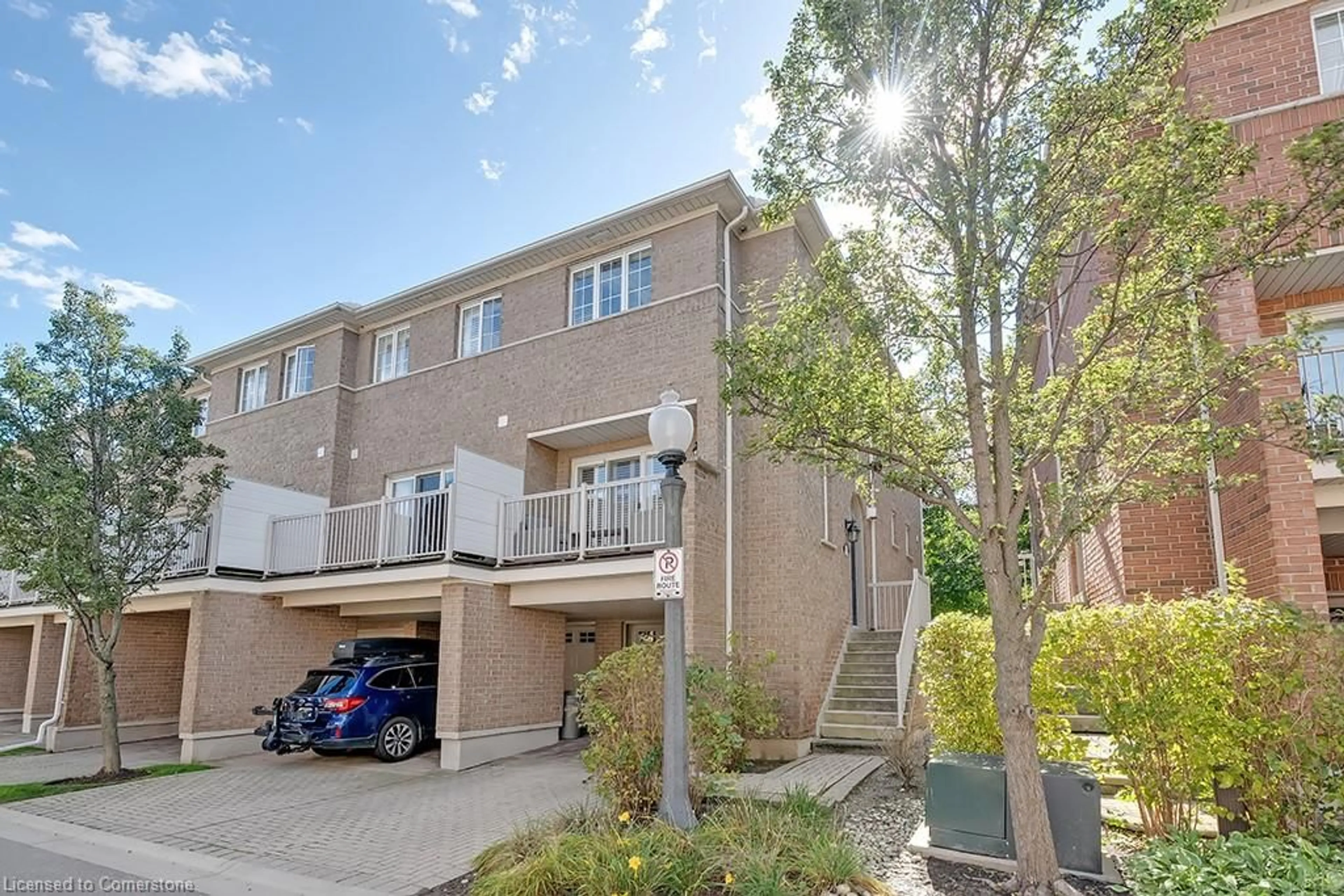 A pic from exterior of the house or condo, the street view for 1169 Dorval Dr #59, Oakville Ontario L6M 4V8