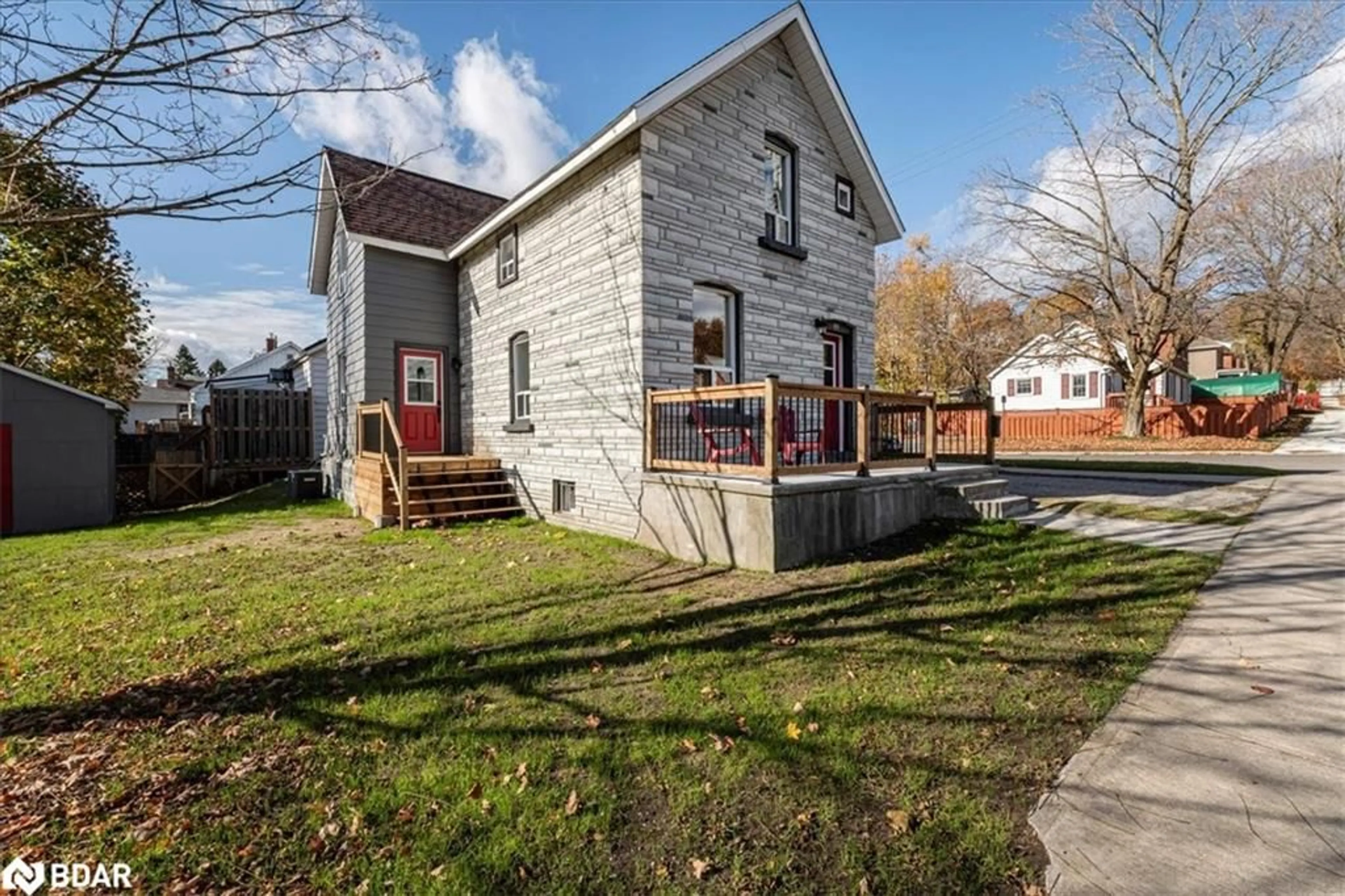 Frontside or backside of a home, the fenced backyard for 89 Douglas St, Orillia Ontario L3V 5Y7