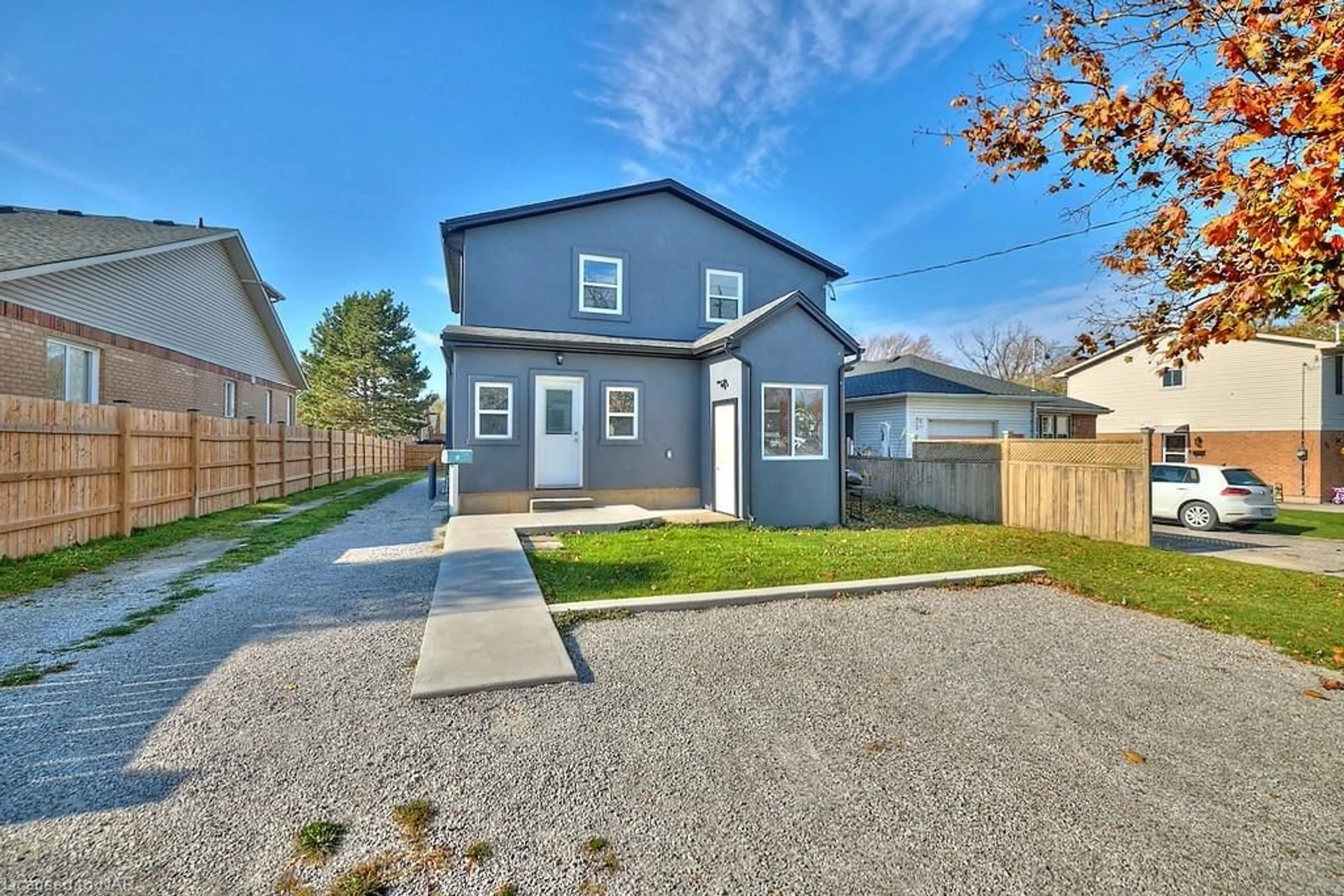 A pic from exterior of the house or condo, the fenced backyard for 61 Bunting Rd, St. Catharines Ontario L2P 1Z1