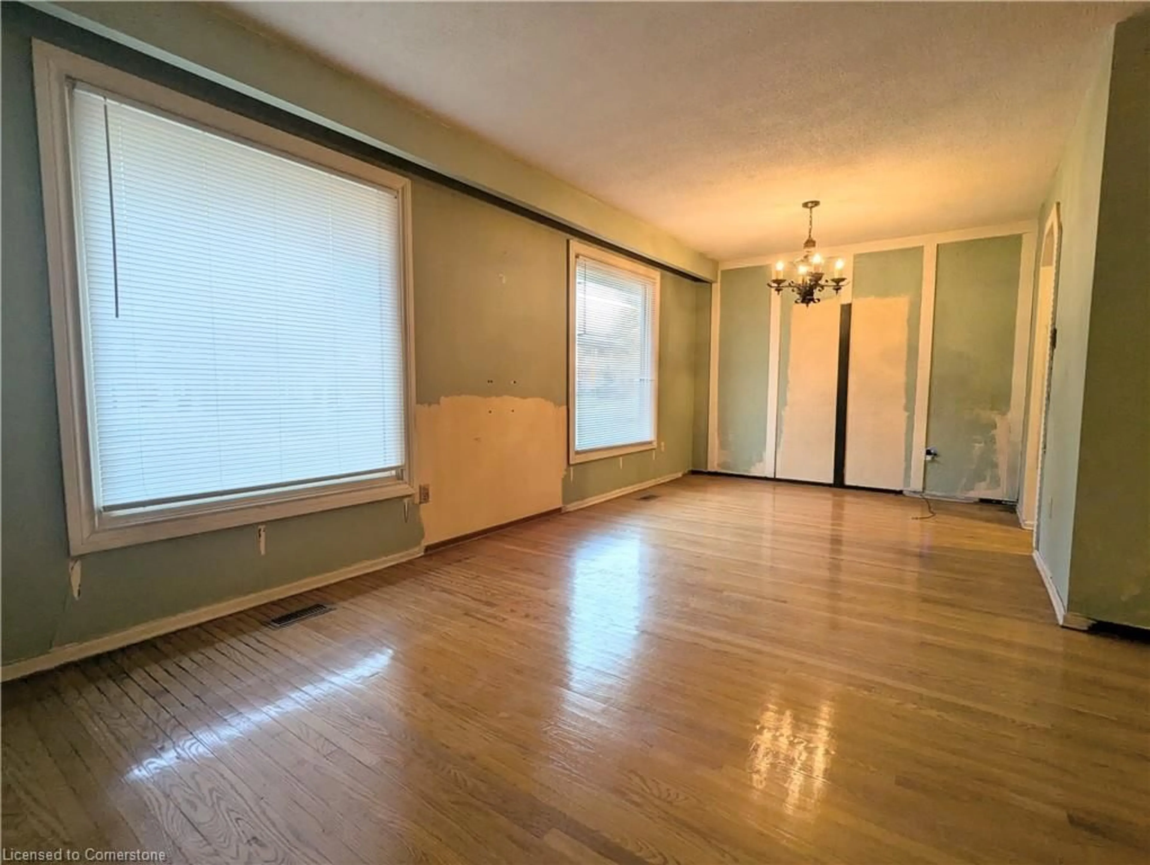 A pic of a room, wood floors for 67 Garrow Dr, Hamilton Ontario L9C 2X2