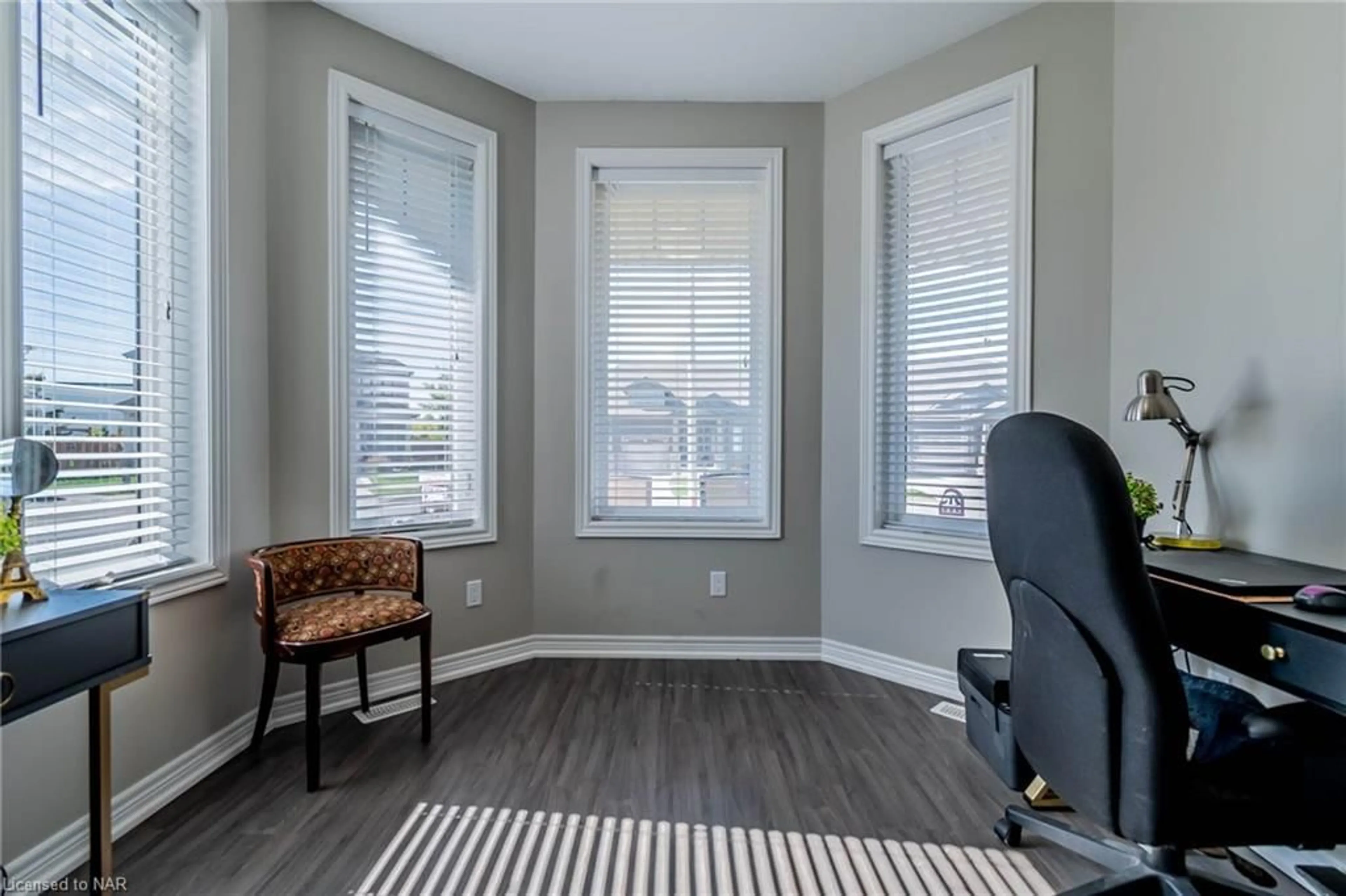 A pic of a room, wood floors for 14 Ellis Ave, St. Catharines Ontario L2P 0E6