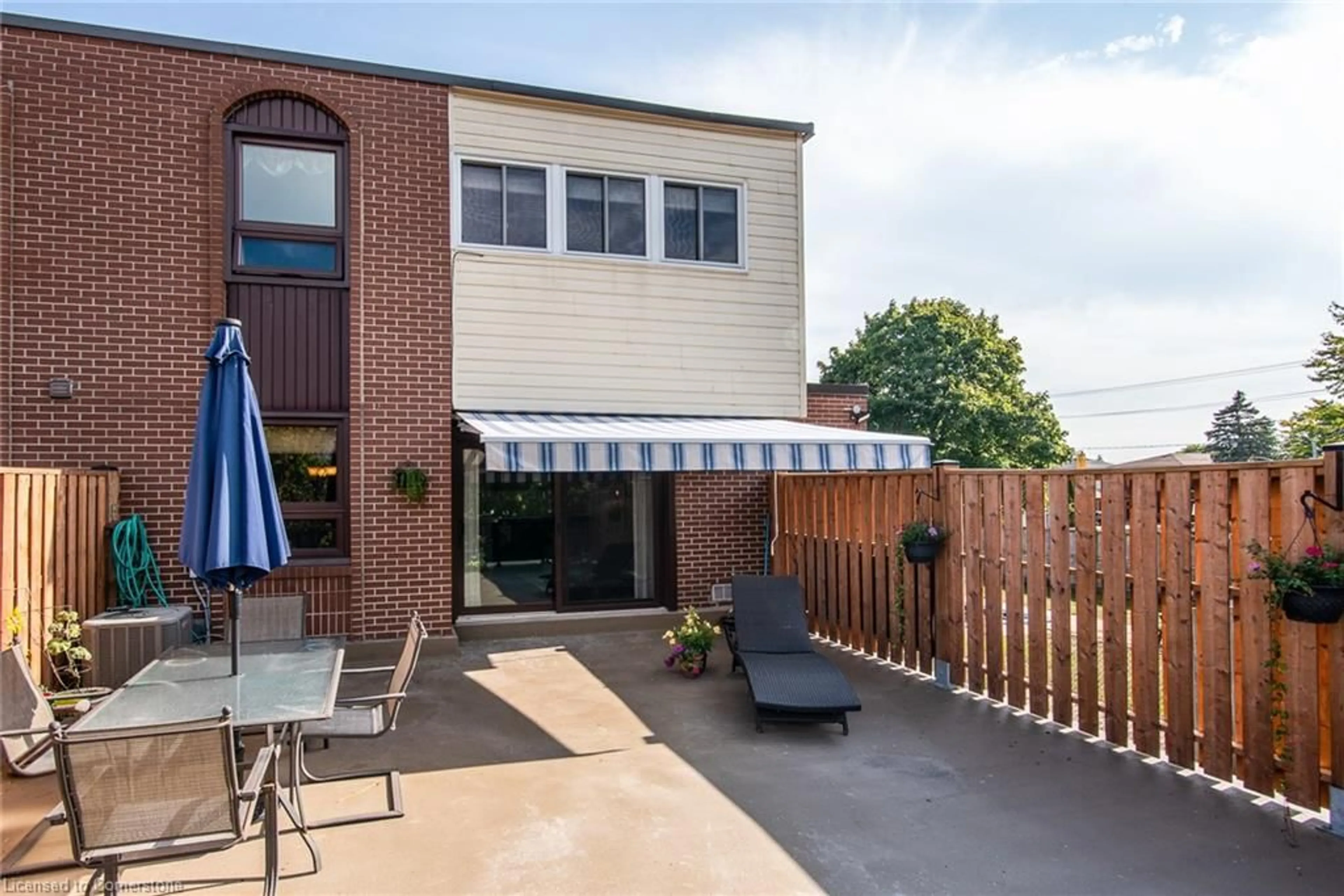 Patio, the fenced backyard for 17 Gibson Dr #1, Kitchener Ontario N2B 2P3