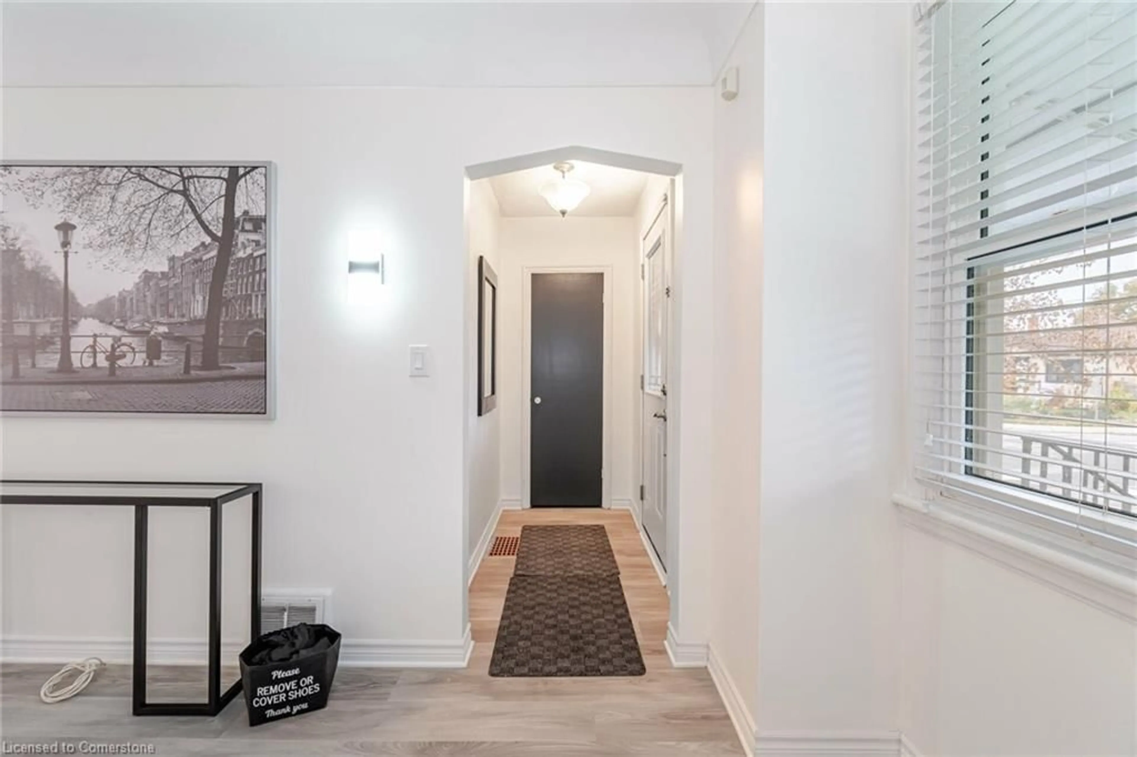 Indoor entryway, wood floors for 204 Summerhill Ave, Hamilton Ontario L8K 3N7