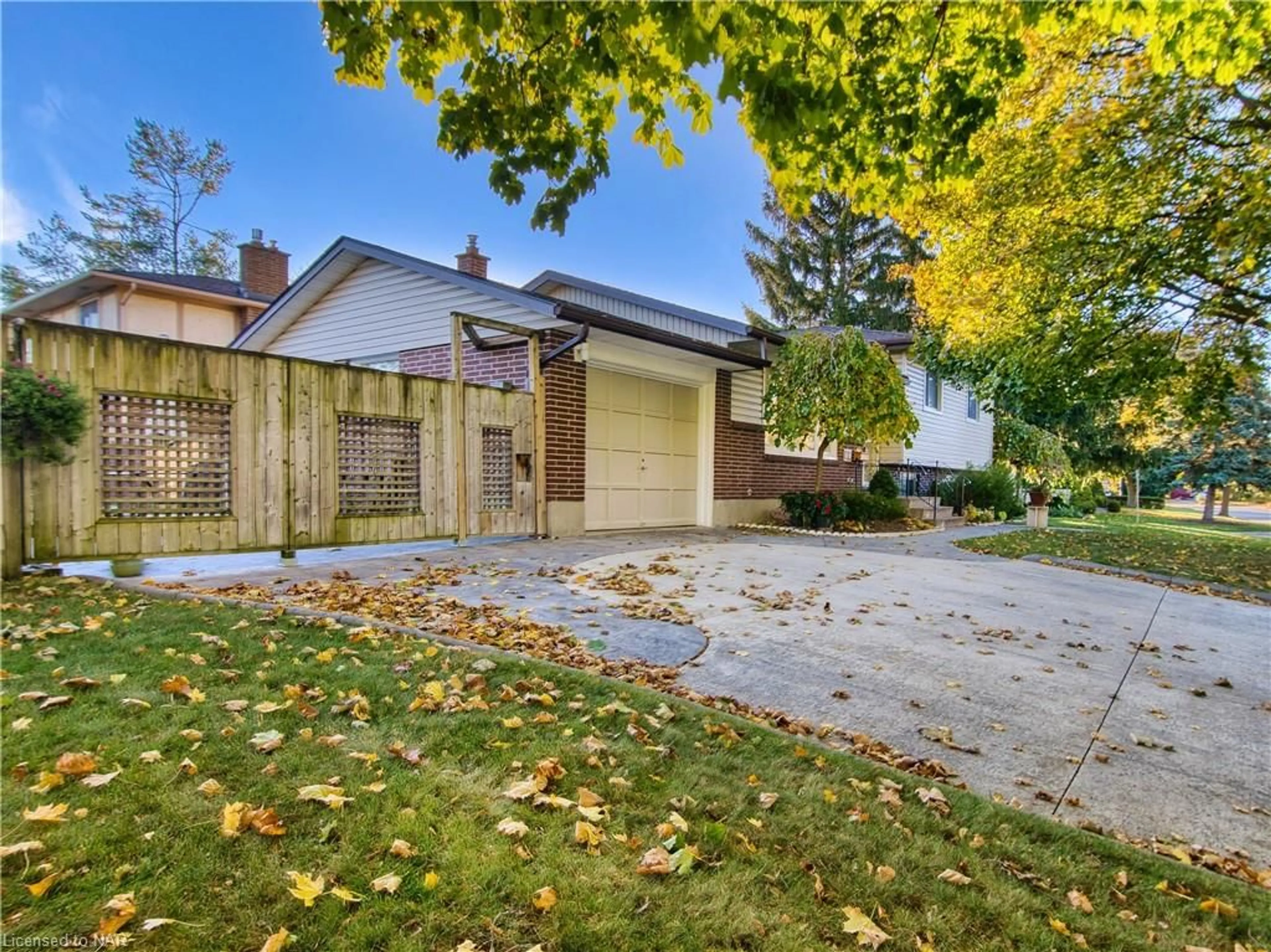 Frontside or backside of a home, the fenced backyard for 40 Longford Cres, St. Catharines Ontario L2N 6E9