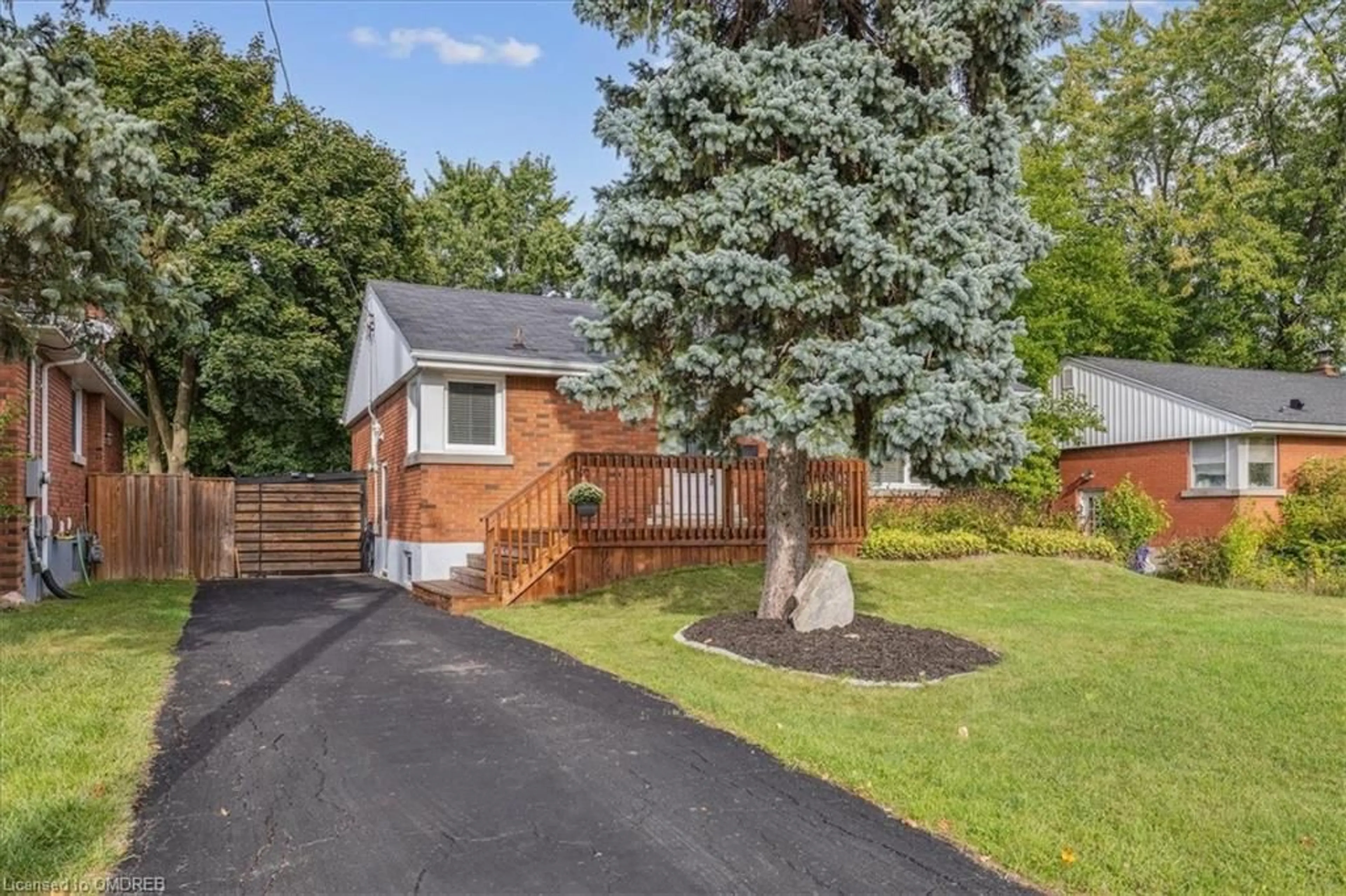 Frontside or backside of a home, the fenced backyard for 1311 Tyrrell Rd, Burlington Ontario L7P 2S3