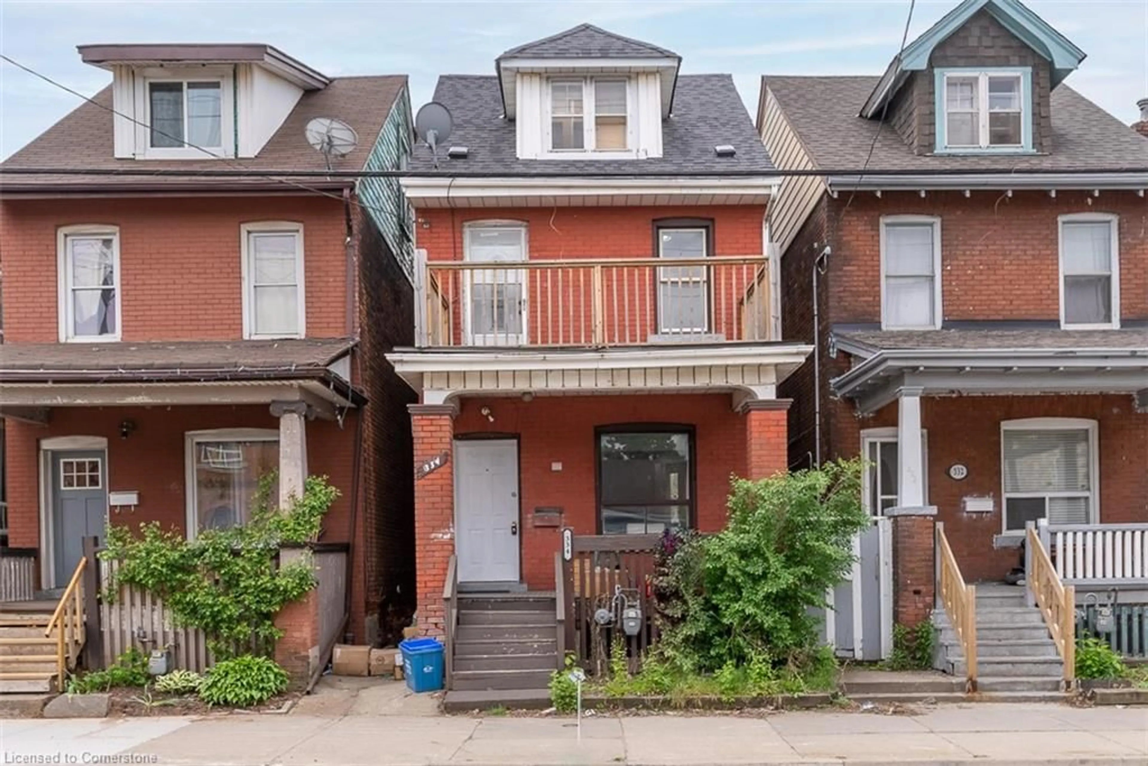 Frontside or backside of a home, the street view for 334 Cannon St, Hamilton Ontario L8L 2B9