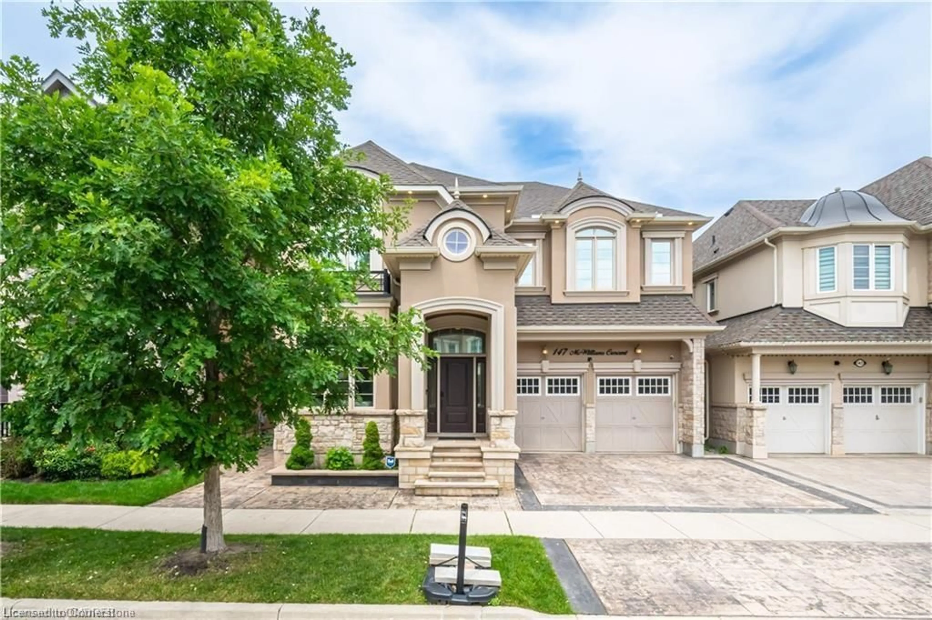 Frontside or backside of a home, the street view for 147 Mcwilliams Cres, Oakville Ontario L6W 0W5