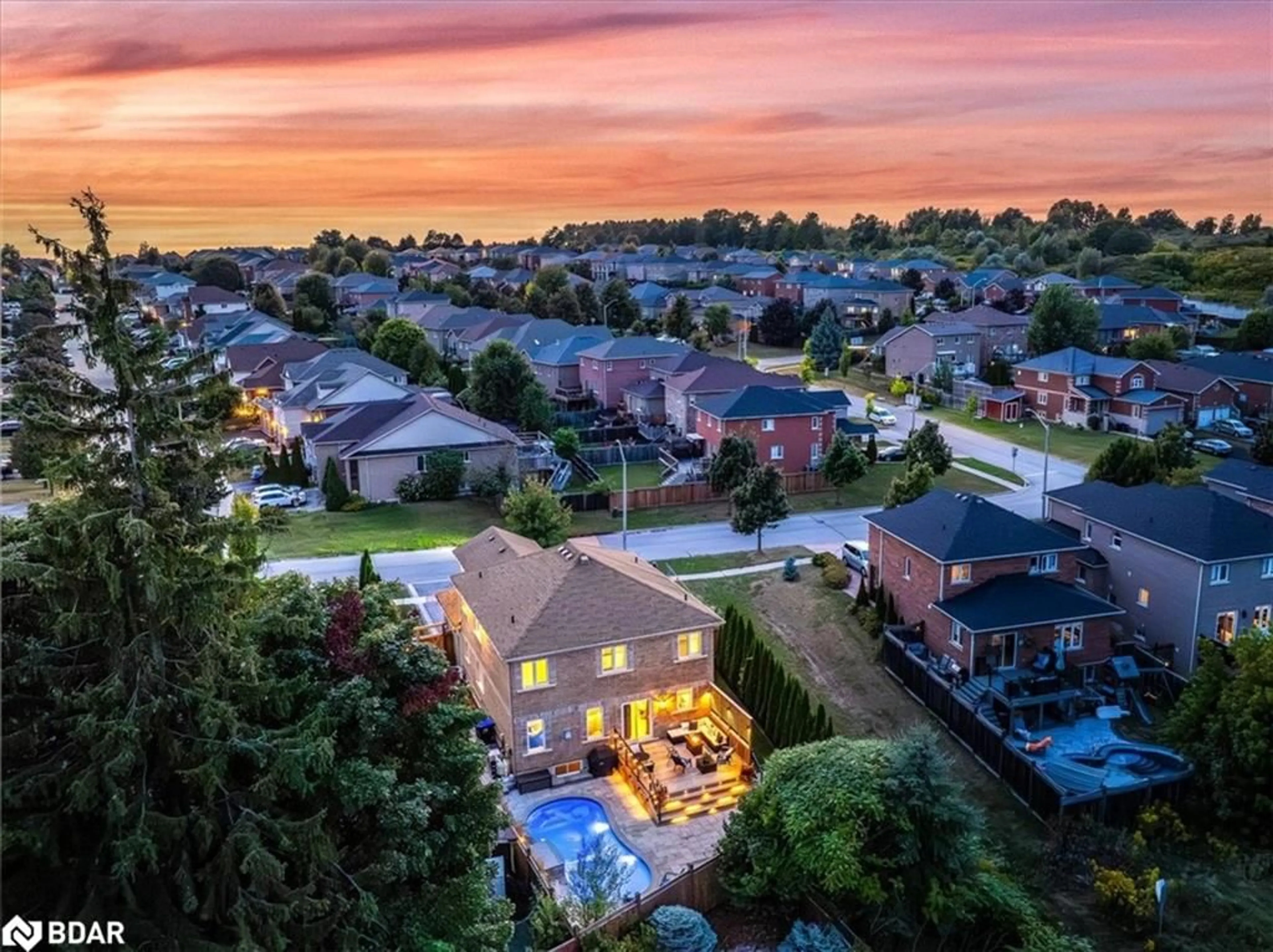 Frontside or backside of a home, the fenced backyard for 15 Meadowview Dr, Bradford Ontario L3Z 3J4