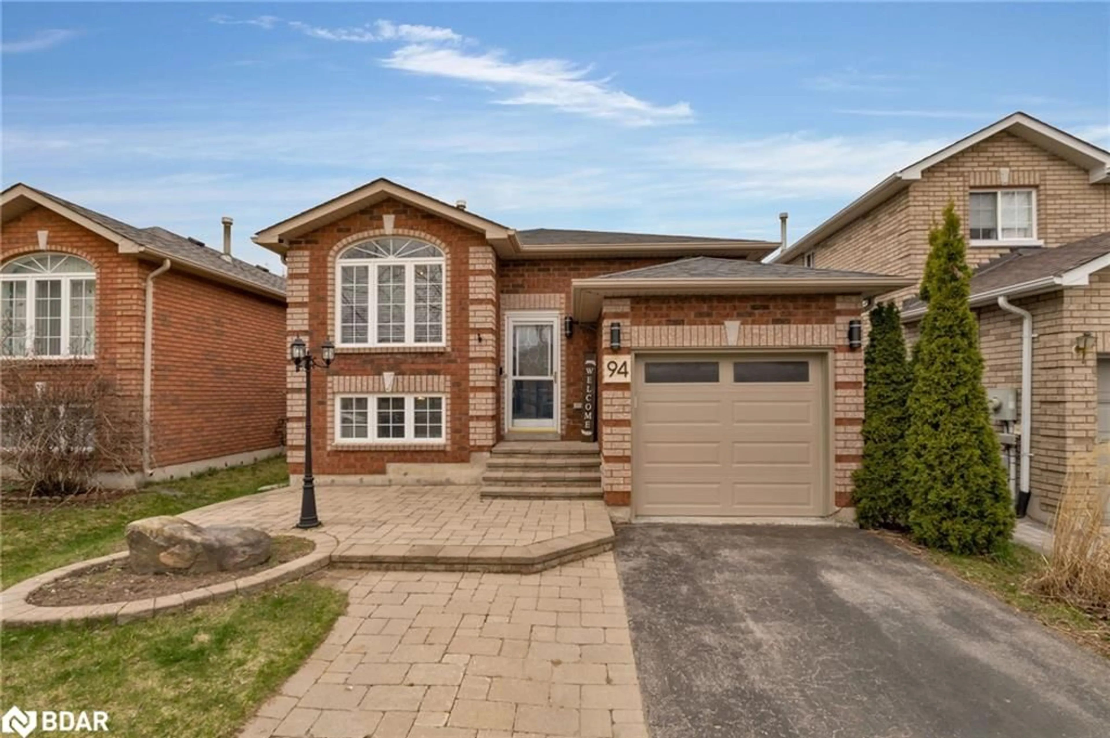 Home with brick exterior material for 94 Butternut Dr, Barrie Ontario L4N 9Z6