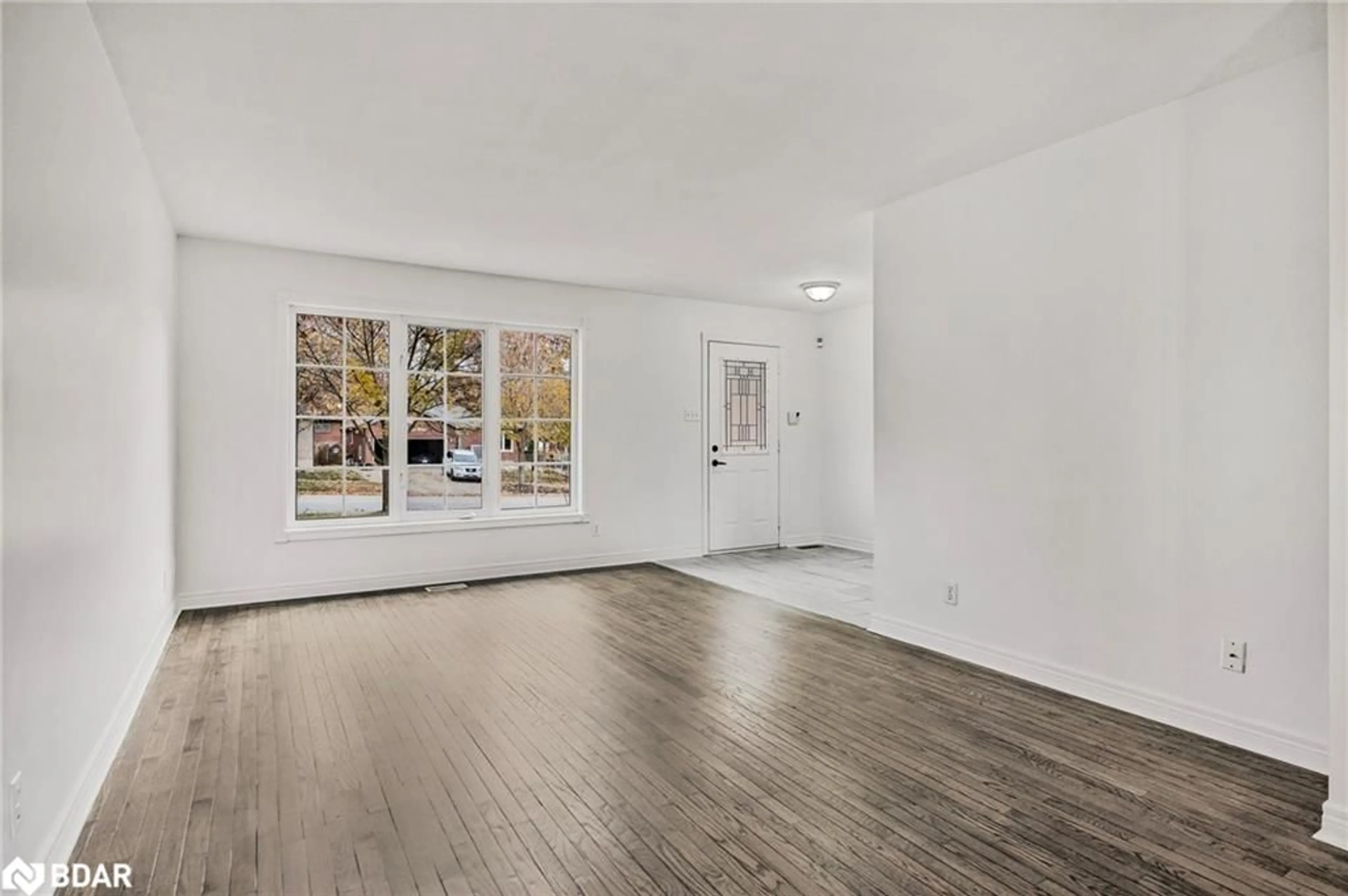 A pic of a room, wood floors for 380 Leacock Dr, Barrie Ontario L4N 7X3