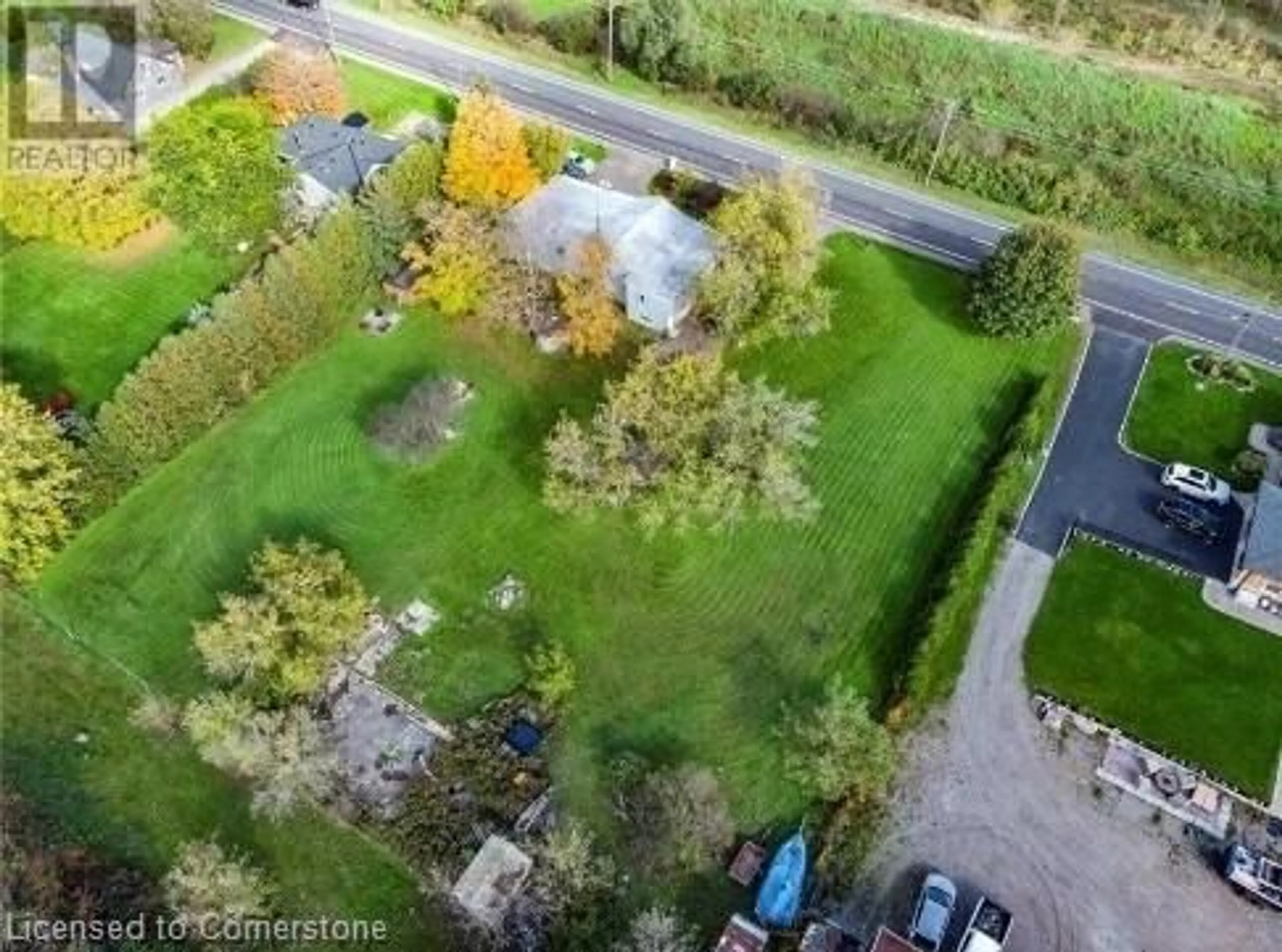 Frontside or backside of a home, the fenced backyard for 767 Brock Rd, Flamborough Ontario L9H 5E4