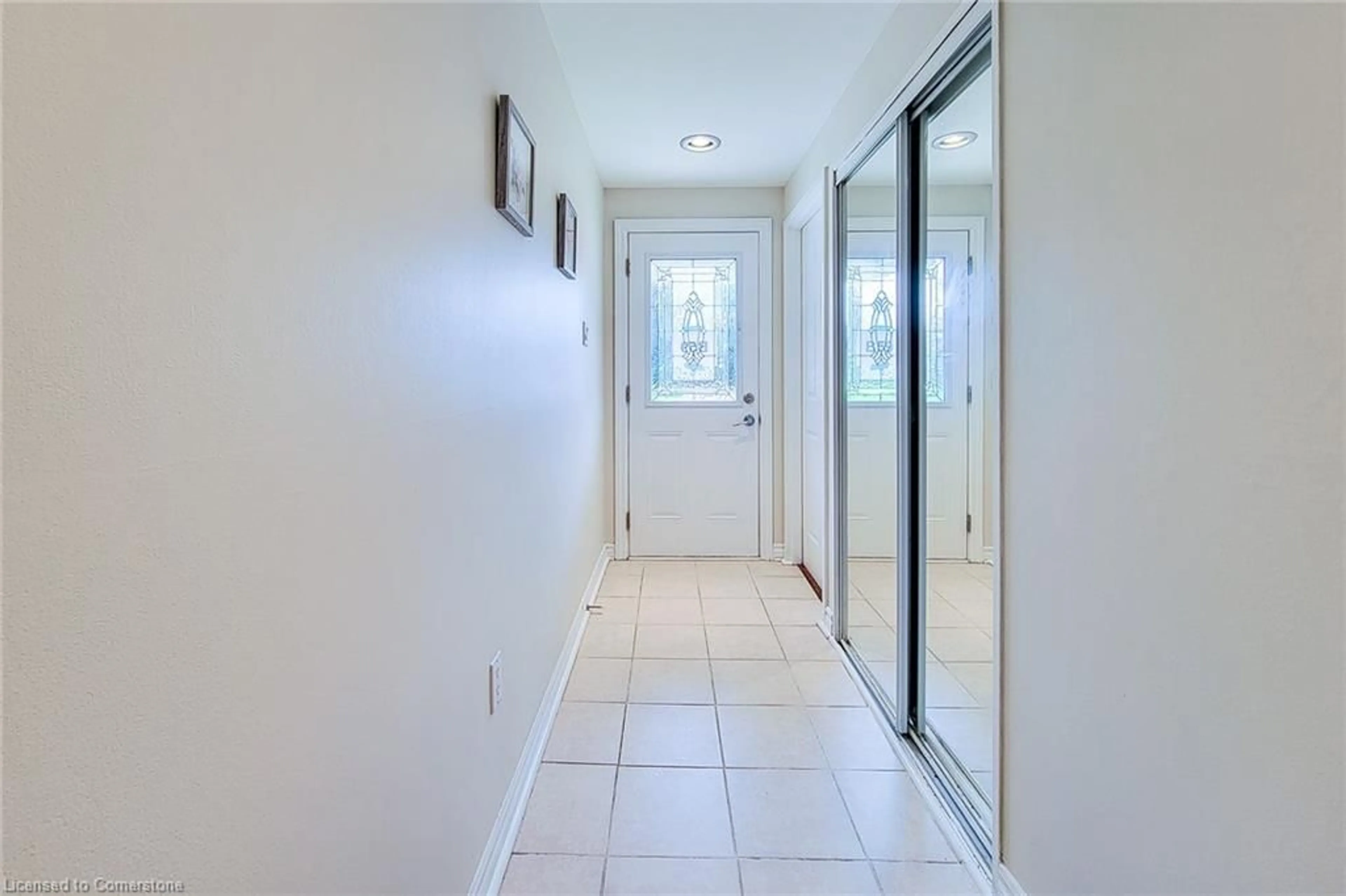 Indoor entryway, wood floors for 25 Britten Close #B59, Hamilton Ontario L9C 4J8