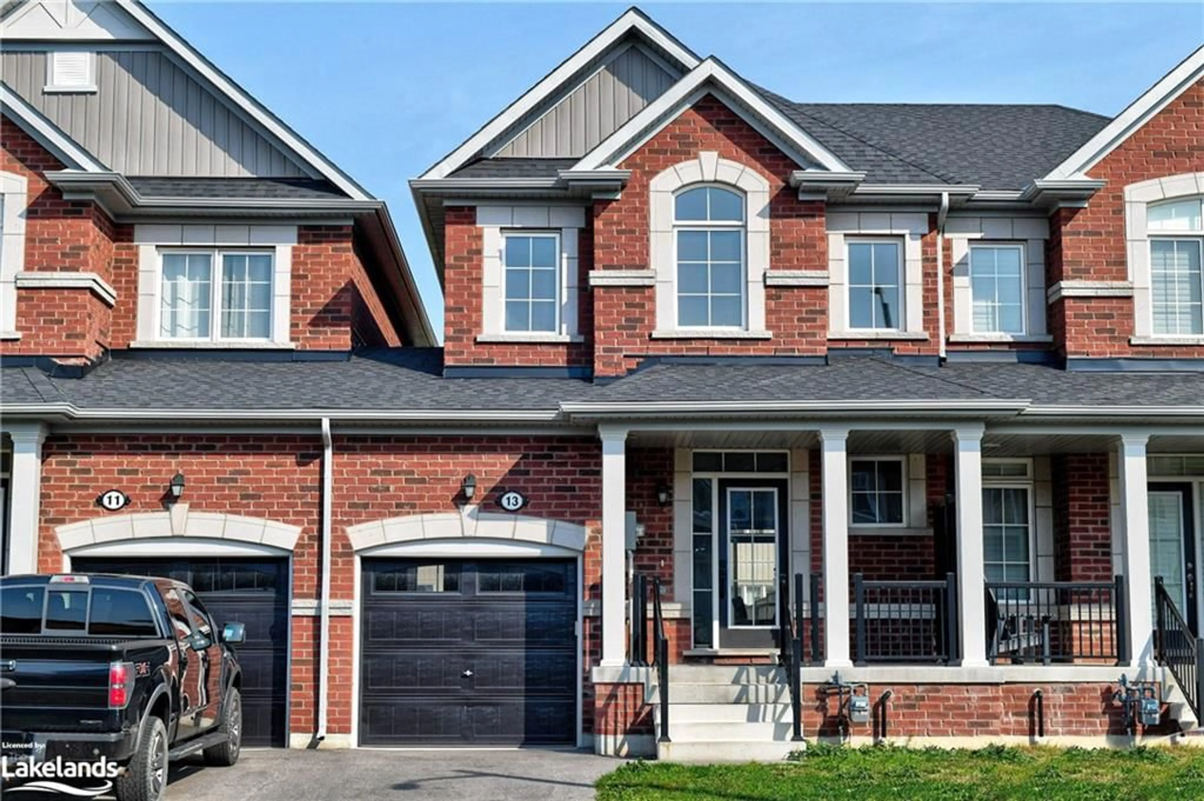 Home with brick exterior material for 13 Barfoot St, Collingwood Ontario L9Y 3Y7