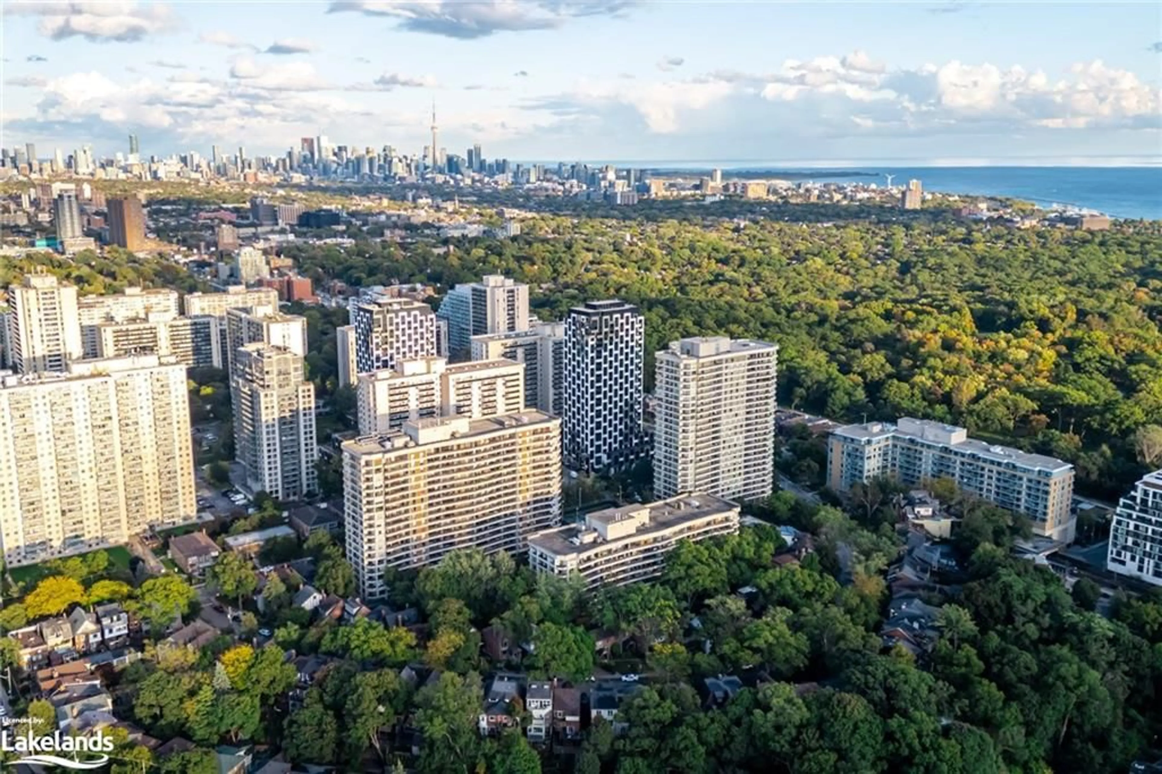 A pic from exterior of the house or condo, the view of city buildings for 80 Quebec Ave #106, Toronto Ontario M6P 4B7