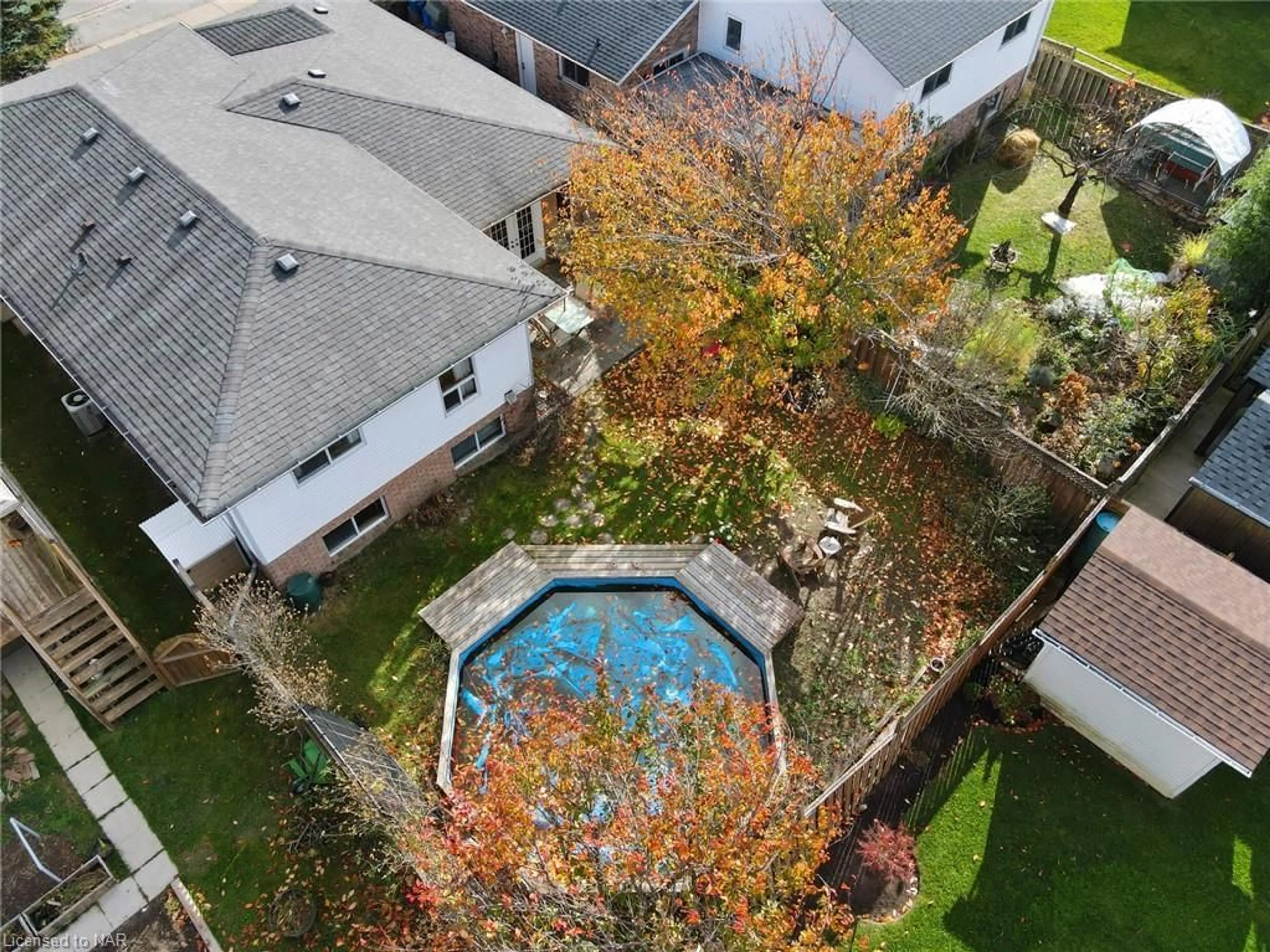 Frontside or backside of a home, the fenced backyard for 4997 Southview Ave, Niagara Falls Ontario L2H 2X4