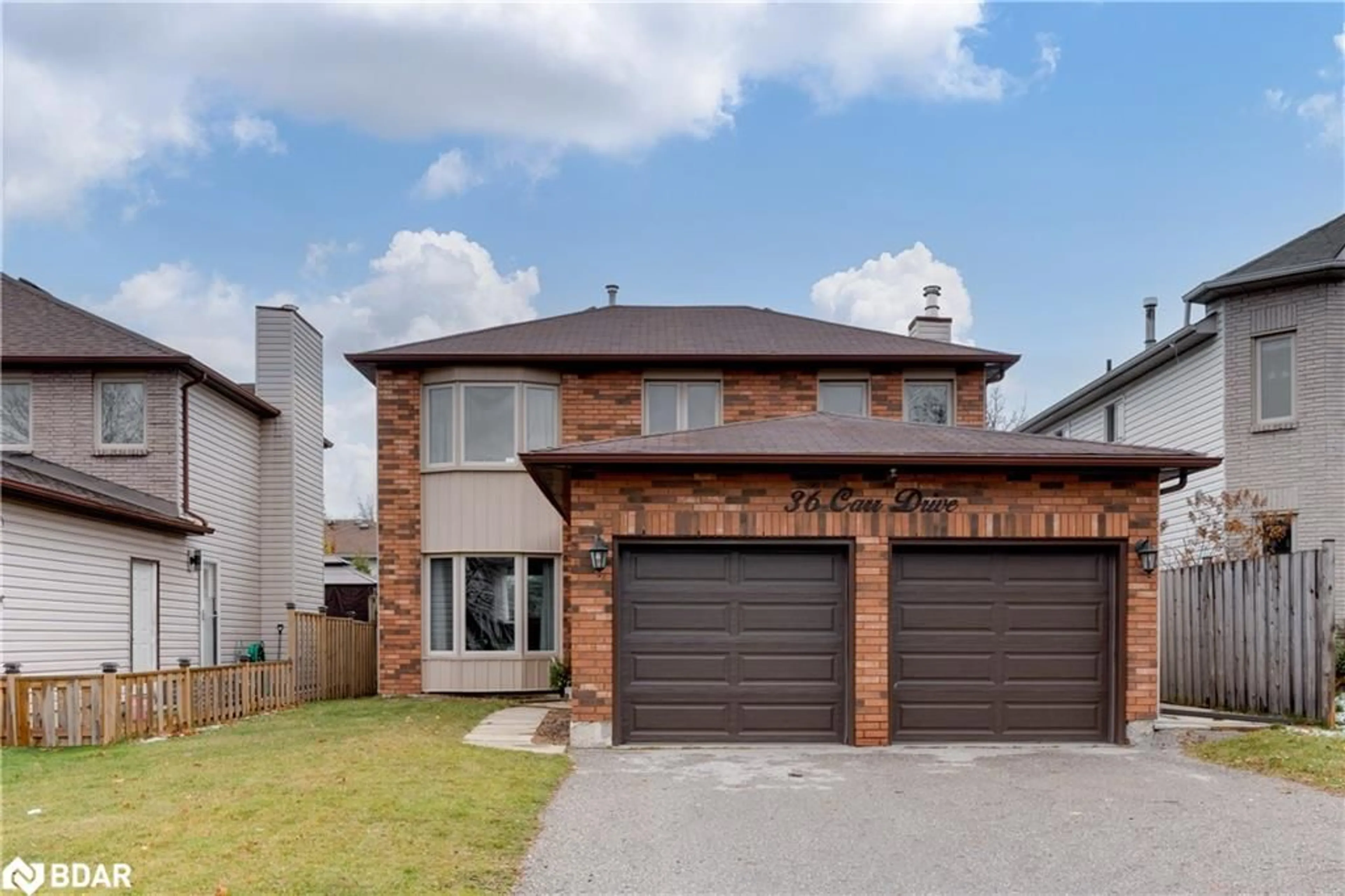 Frontside or backside of a home, cottage for 36 Carr Dr, Barrie Ontario L4N 6M9