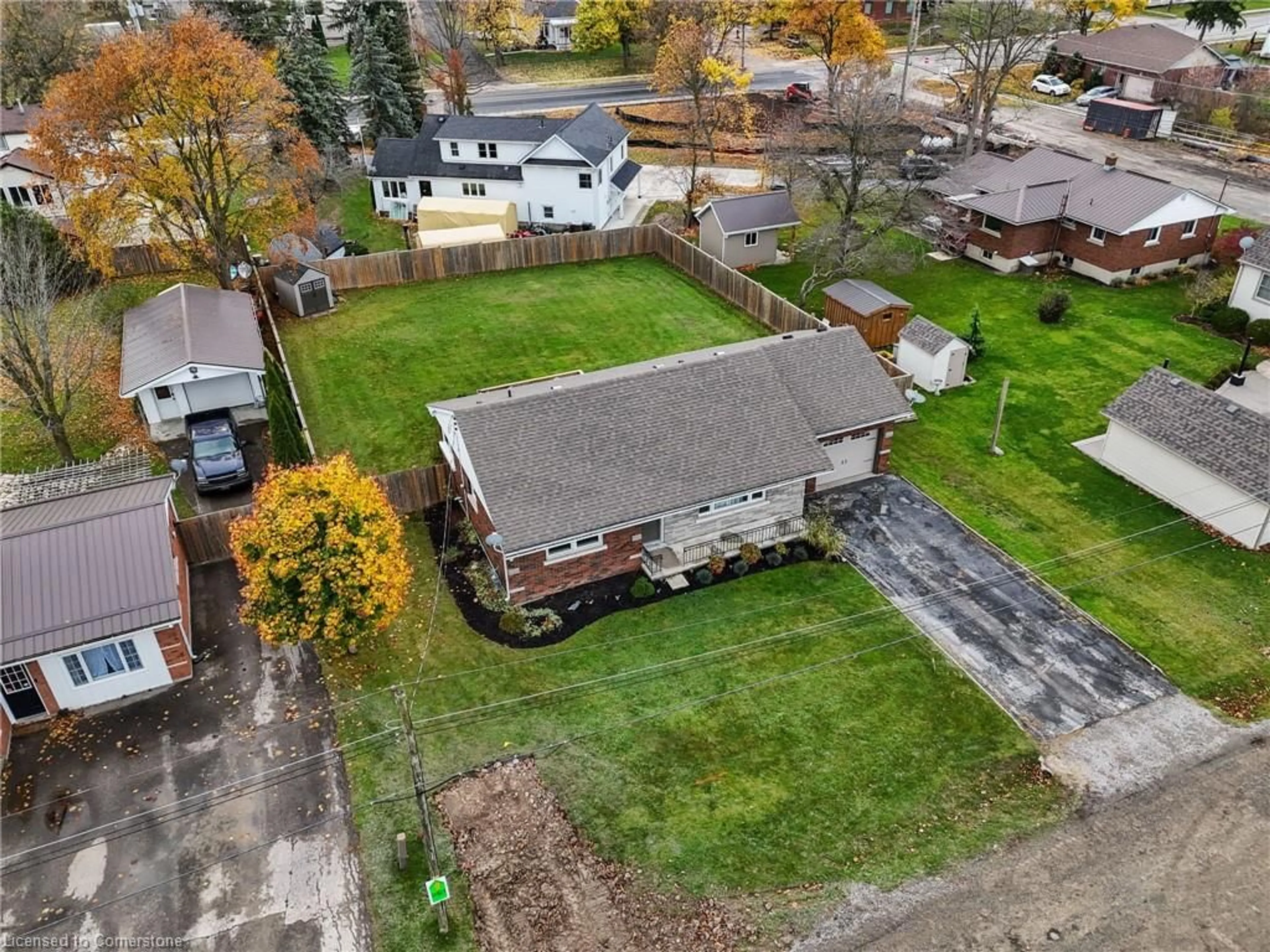 Frontside or backside of a home, the fenced backyard for 24 Peel St, Jarvis Ontario N0A 1J0