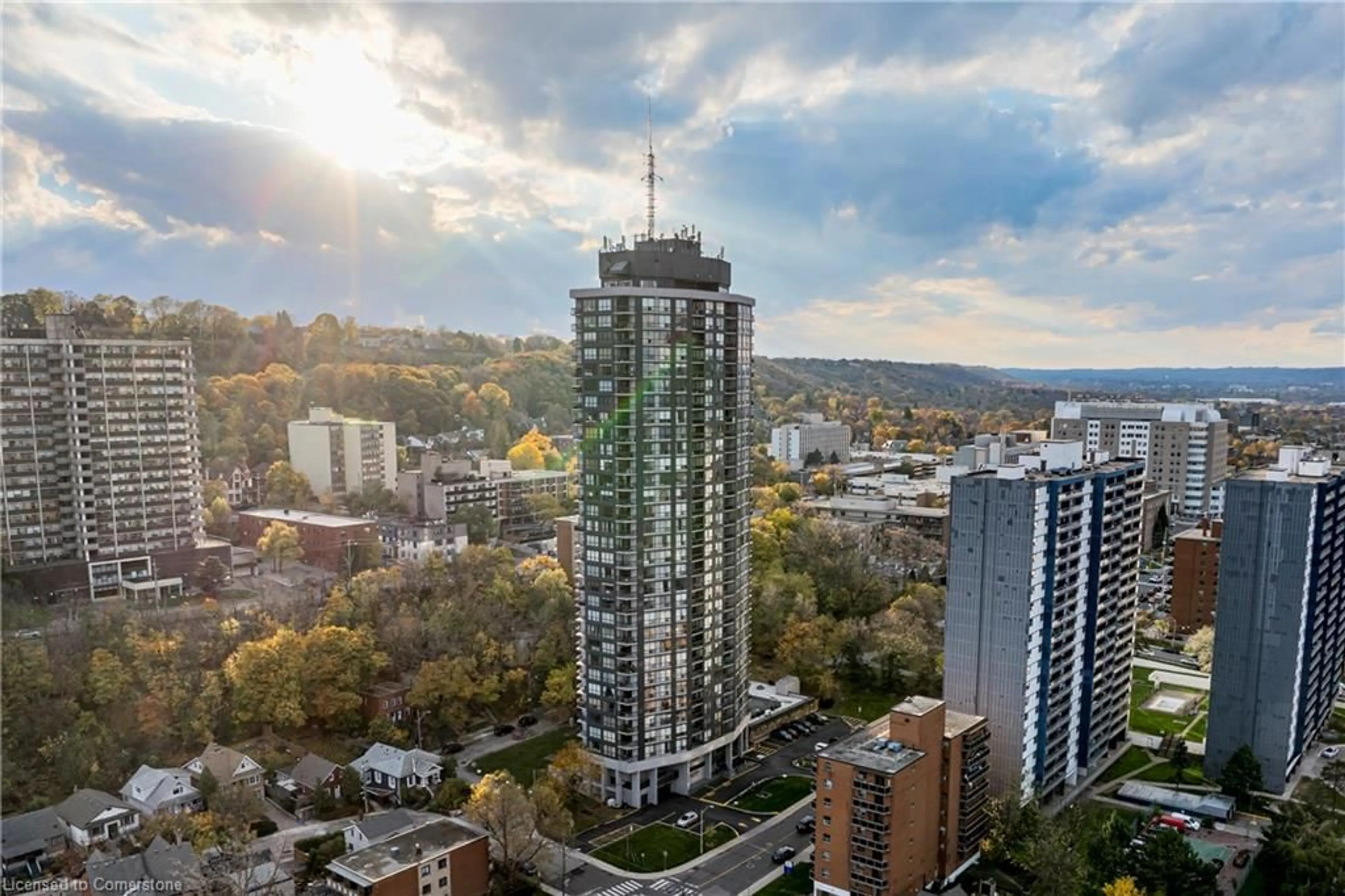 A pic from exterior of the house or condo, the view of city buildings for 150 Charlton Ave #1401, Hamilton Ontario L8N 3X3