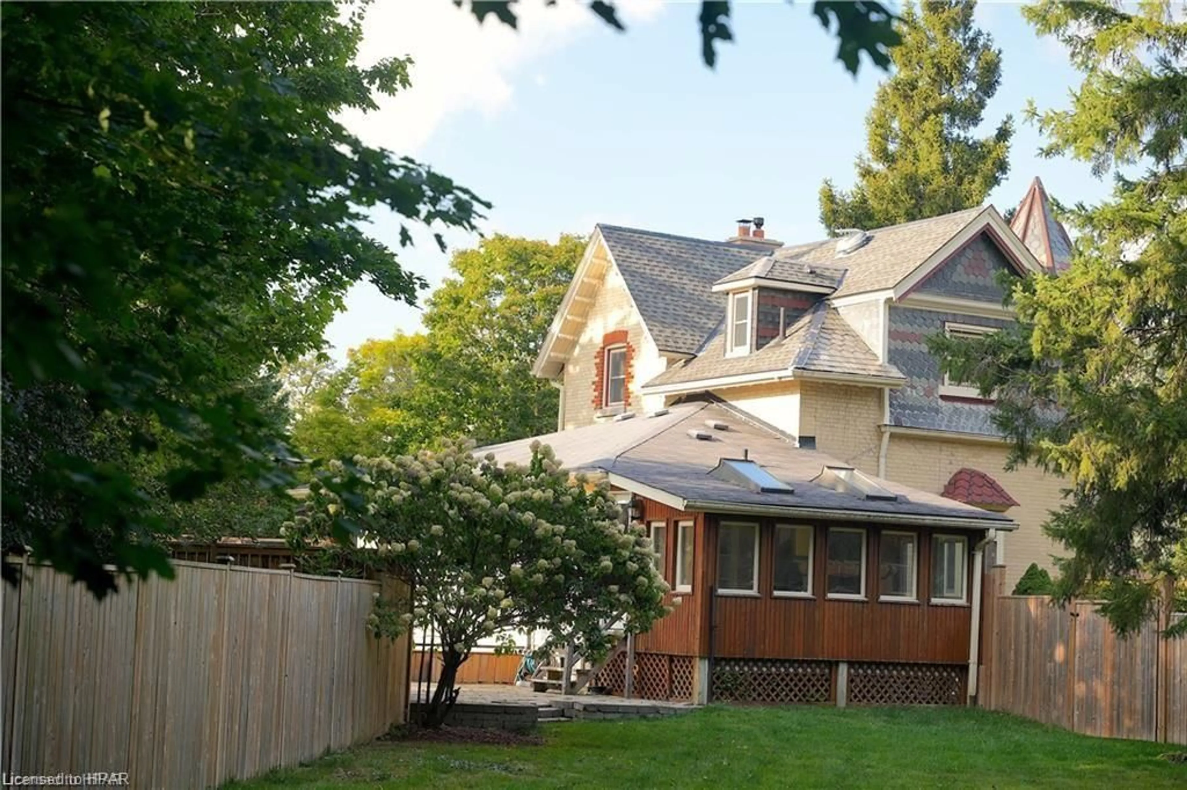 Frontside or backside of a home, the fenced backyard for 310 Northumberland St, Ayr Ontario N0B 1E0